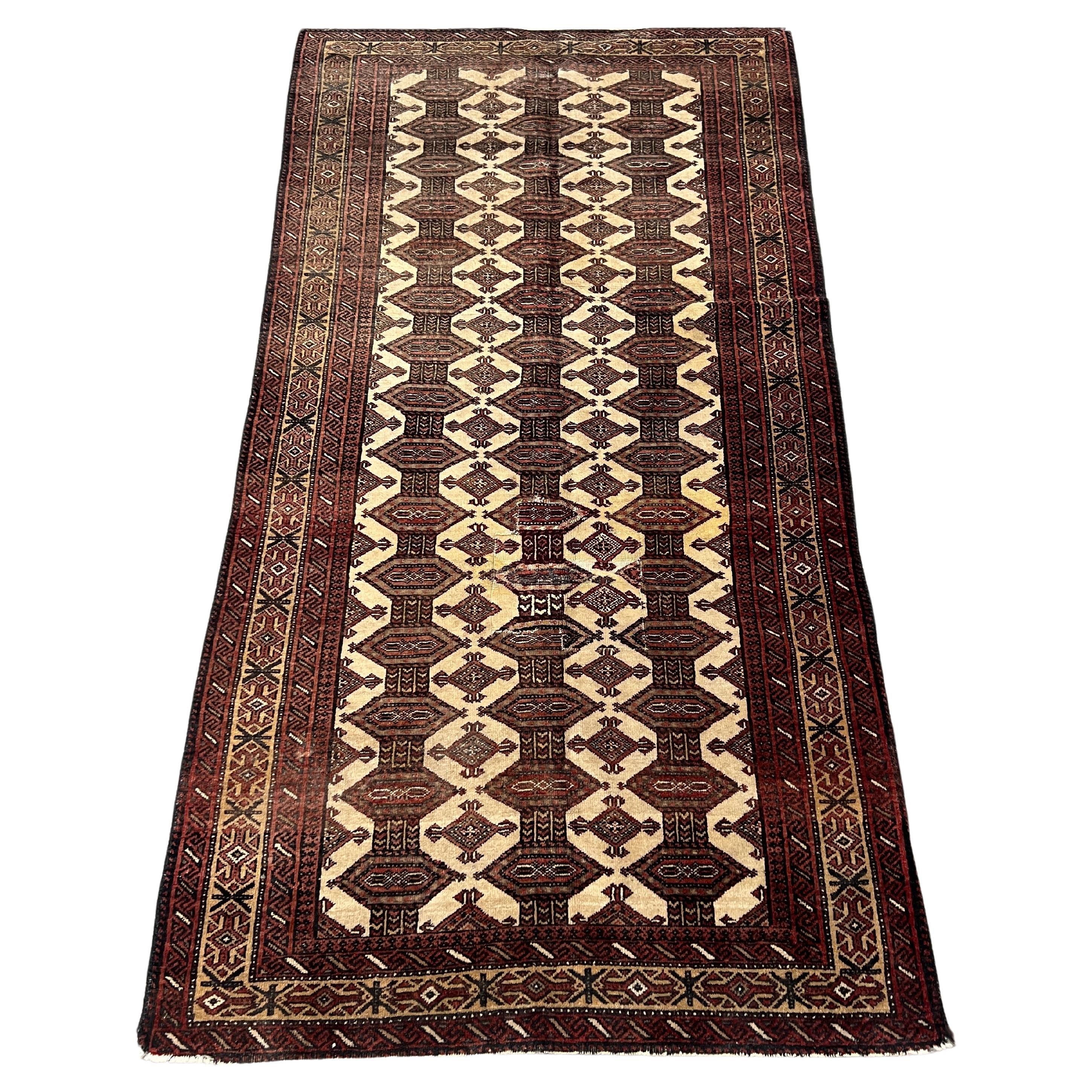 Semi-Antique Afghan Baluchi Wool Rug 6'1" x 3' 2" For Sale