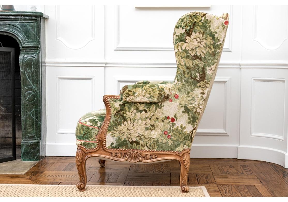 Semi Antique Custom Upholstered Carved Wing Chair For Sale 6