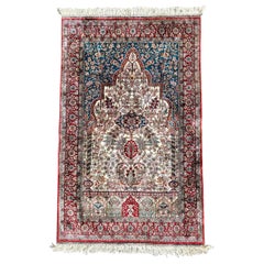 Tapis de prière turc semi-ancien Hereke, en pure soie, signé