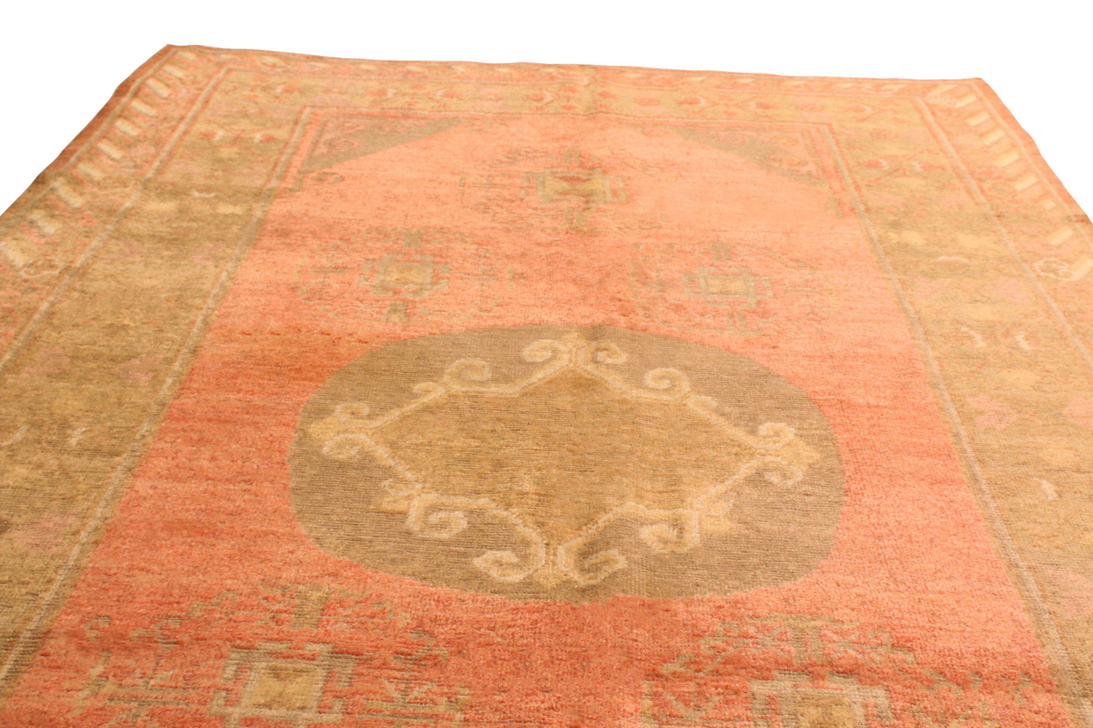 Originating from East Turkestan between 1920-1940, this antique transitional Khotan rug from Rug & Kilim has several uniquely subtle influences on its design. As Khotan rugs are known for their individuality from piece to piece, this rug’s lack of