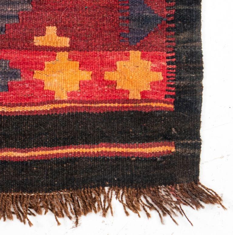 Semi-antique Kilim hand-woven wool carpet with a geometric diamond design. 

Dealer: S138XX