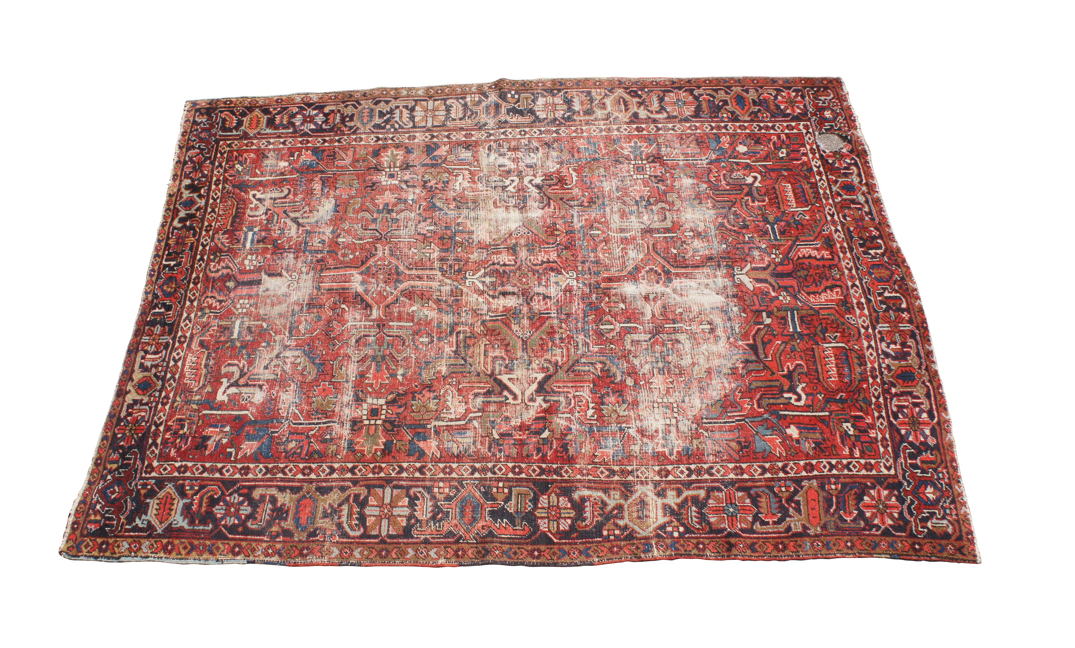 Semi-Antique oriental carpet.  Features traditional floral motifs in red with beige and brown accents.

Dimensions:
134
