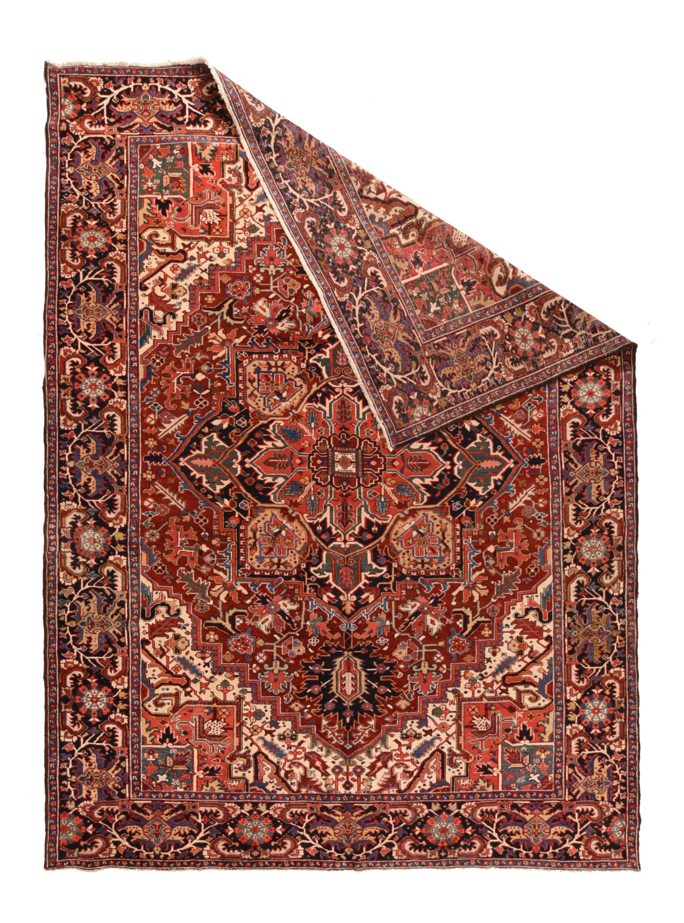 This is a totally classic NW Persian village carpet with a totally natural dye palette including: a madder red field with a navy indigo palmette octogramme medallion and ivory corners with salmon red “quarter medallion” inward projections.  Mustard,