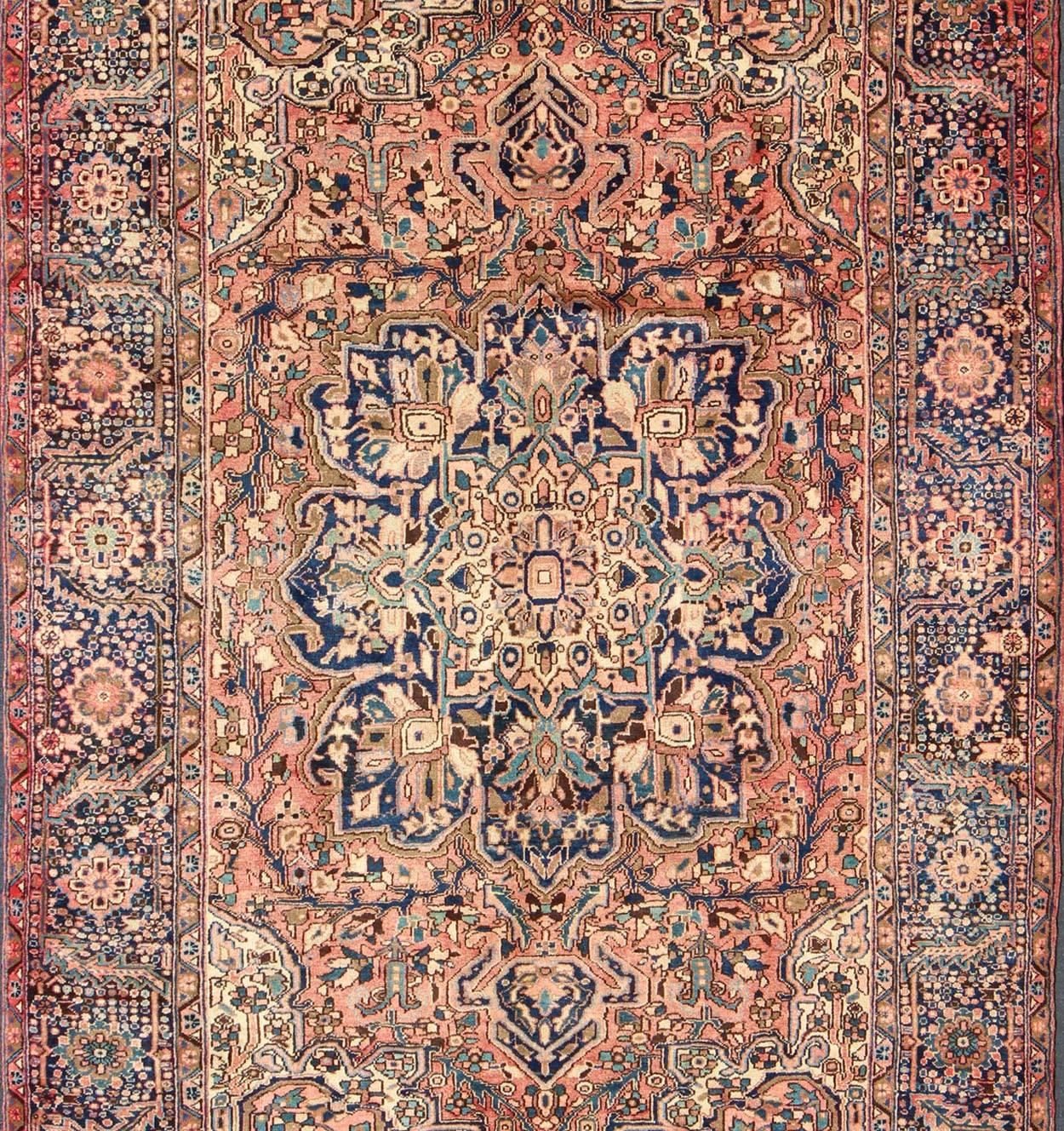 Heriz Serapi Semi Antique Persian Heriz Rug with Geometric Medallion in Salmon and Royal Blue