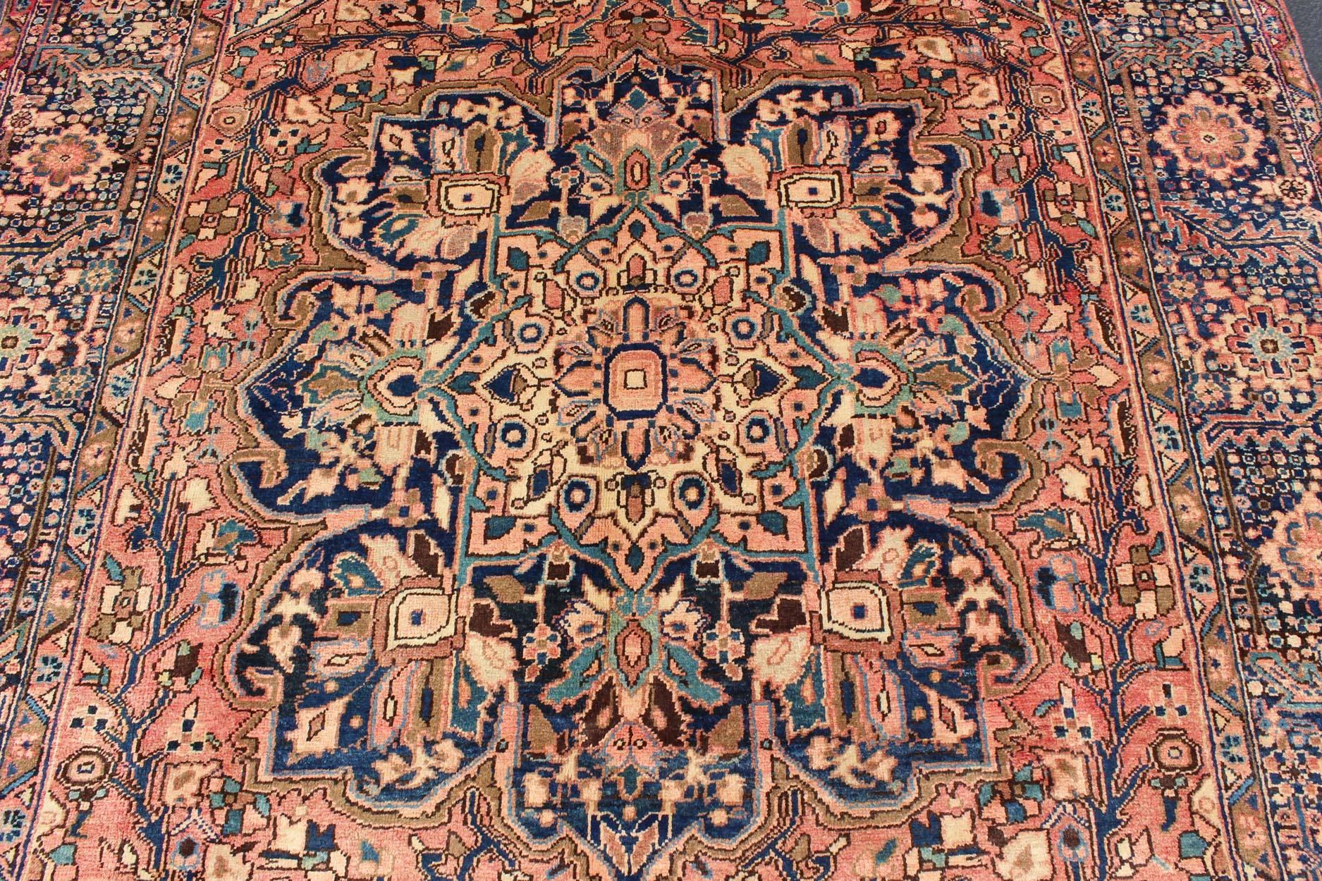 Mid-20th Century Semi Antique Persian Heriz Rug with Geometric Medallion in Salmon and Royal Blue
