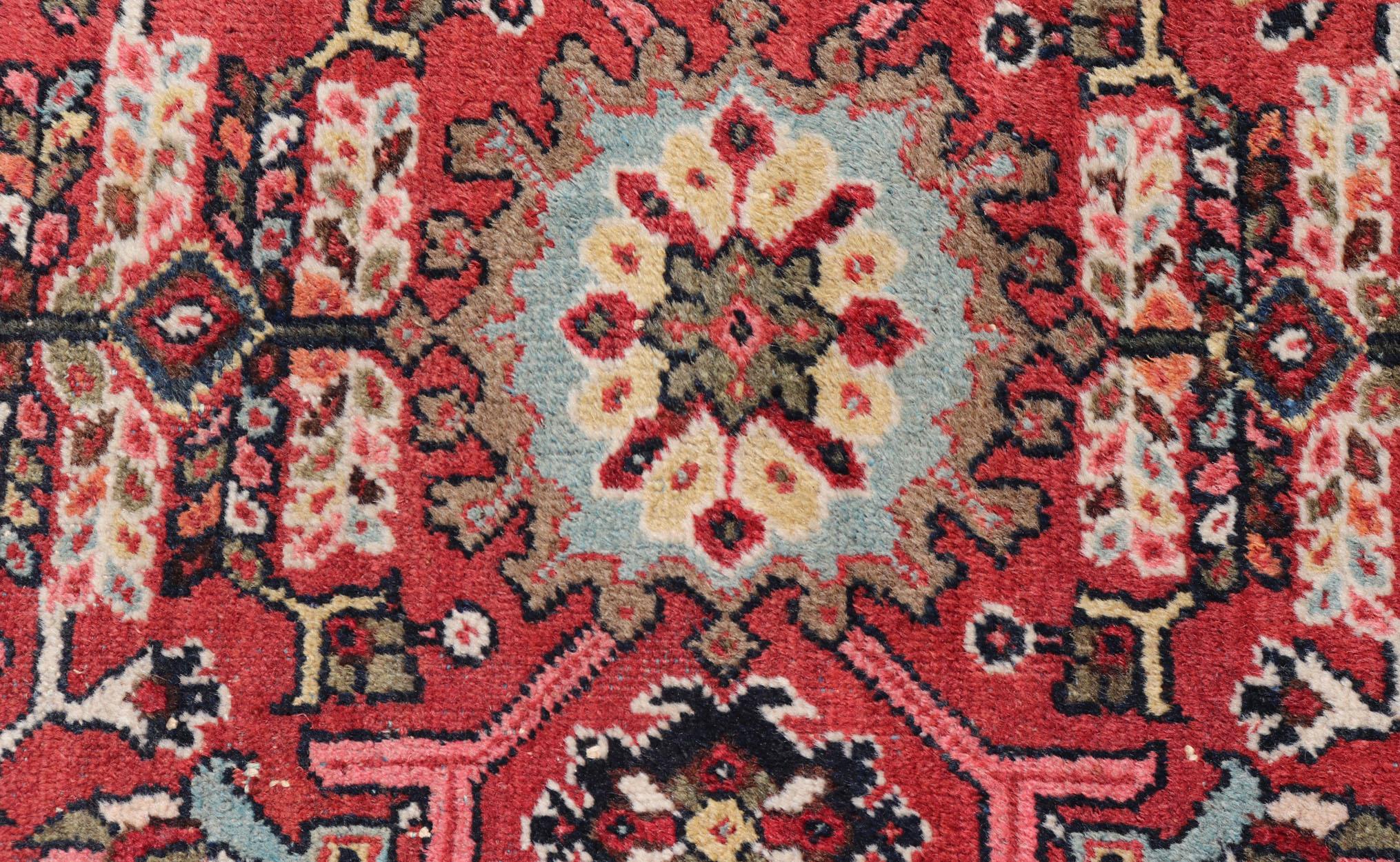 Persian semi antique Mahal rug with medallion design in red with jewel tones
Keivan Woven Arts / rug PTA-200712, country of origin / type: Iran / Sultanabad, circa mid-20th century
Measures: 7'1 x 10'7.