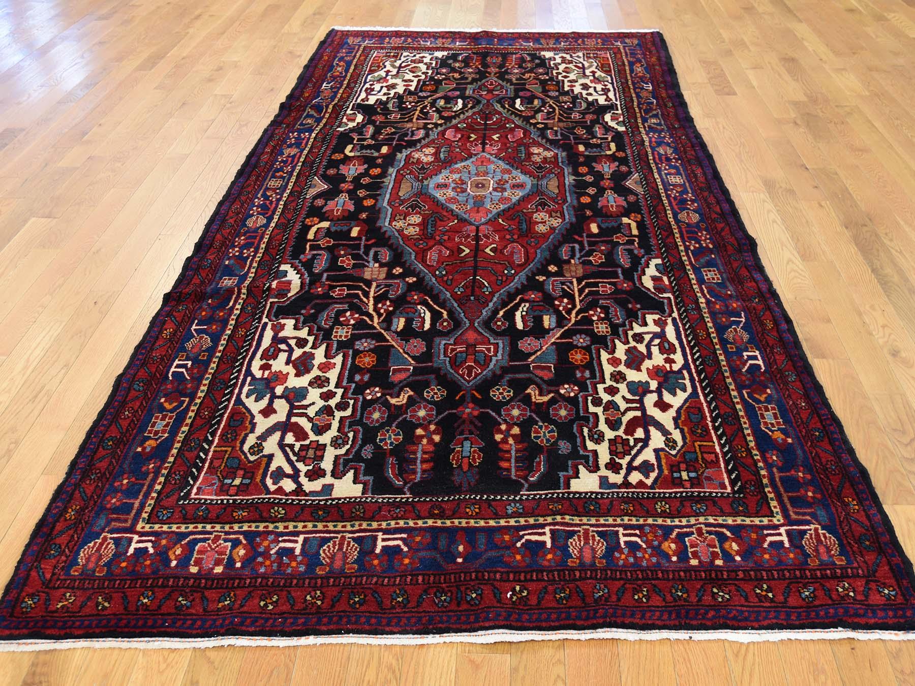 This is a truly genuine one-of-a-kind Semi antique Persian Nahavand hand knotted wide runner rug. It has been knotted for months and months in the centuries-old Persian weaving craftsmanship techniques by expert artisans.

Primary materials: