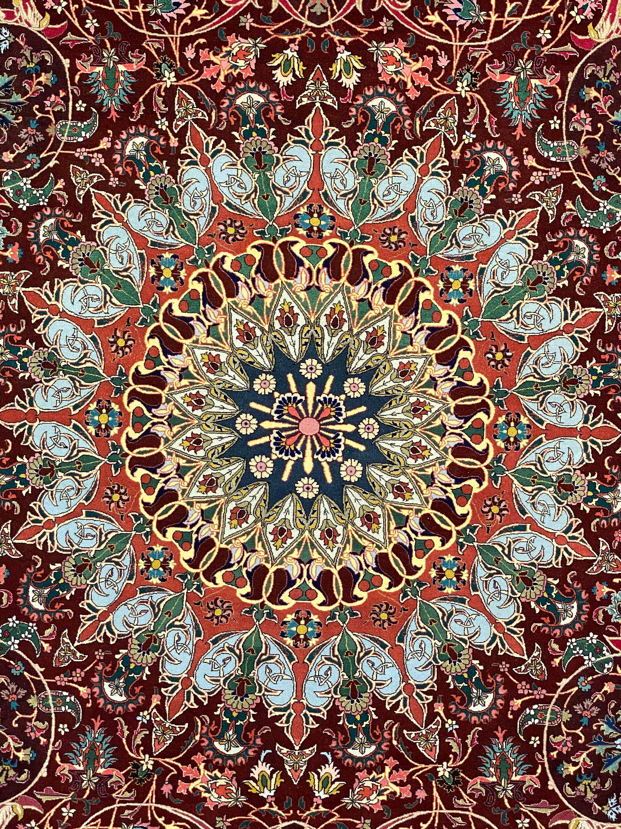 In excellent condition, this Tremendous Tabriz is rare to find. Hand knotted with wonderful soft kork wool and silk highlights, balanced color combination, and extremely fine technique of weave. The high technique allows for above-and-beyond detail