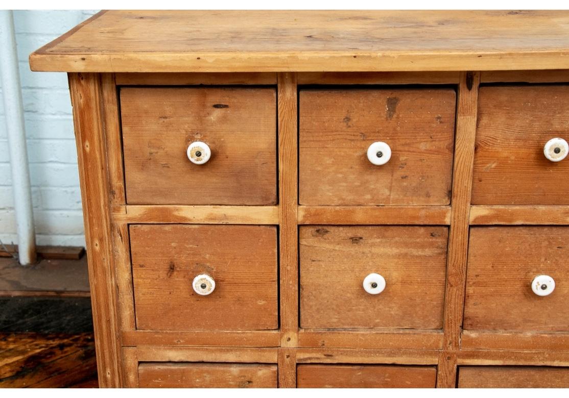Rustic Semi Antique Pine 16-Drawer Apothecary Cabinet