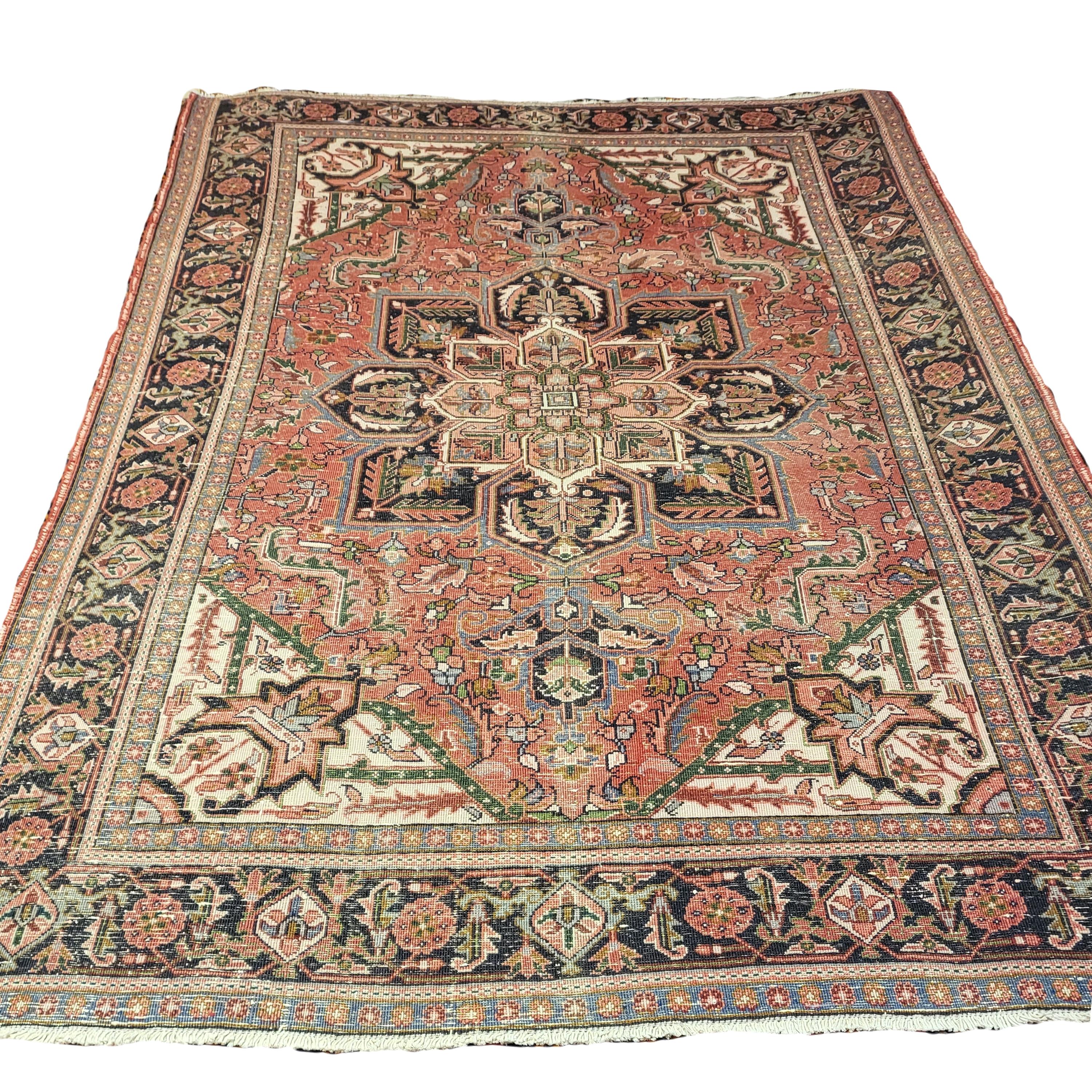 Gorgeous Mid 20th Century Heriz

7' 9 x 11'

Beautiful geometric / floral style Serapi rug, that was handwoven by the Ahar tribe of Heriz. Like many Northwestern Persian rugs, this type of Heriz is incredibly thick, heavy and sturdy. These geometric