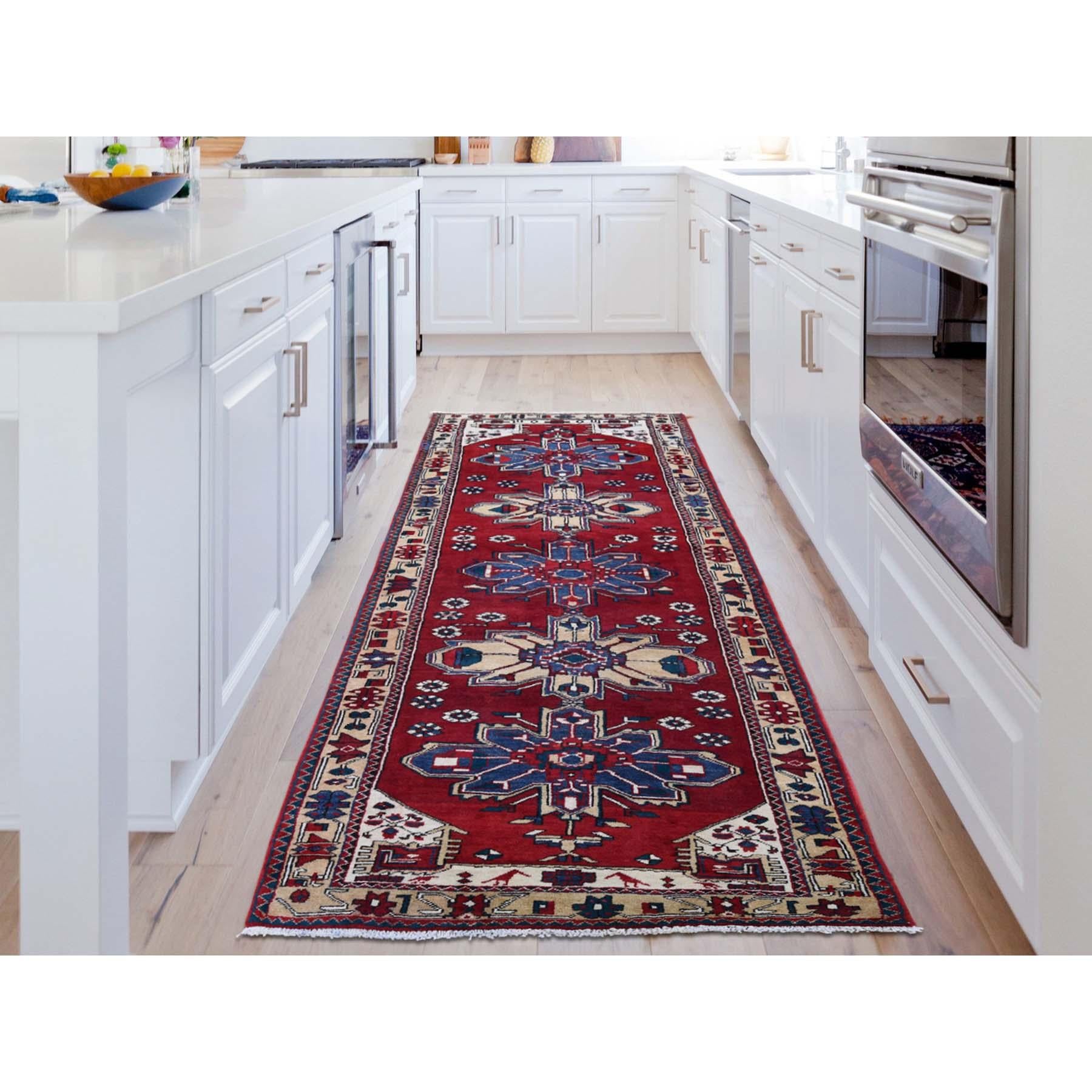 This is a truly genuine one-of-a-kind semi antique vintage Heriz hand knotted oriental rug. It has been knotted for months and months in the centuries-old Persian weaving craftsmanship techniques by expert artisans.

Primary materials: Wool
Latex: