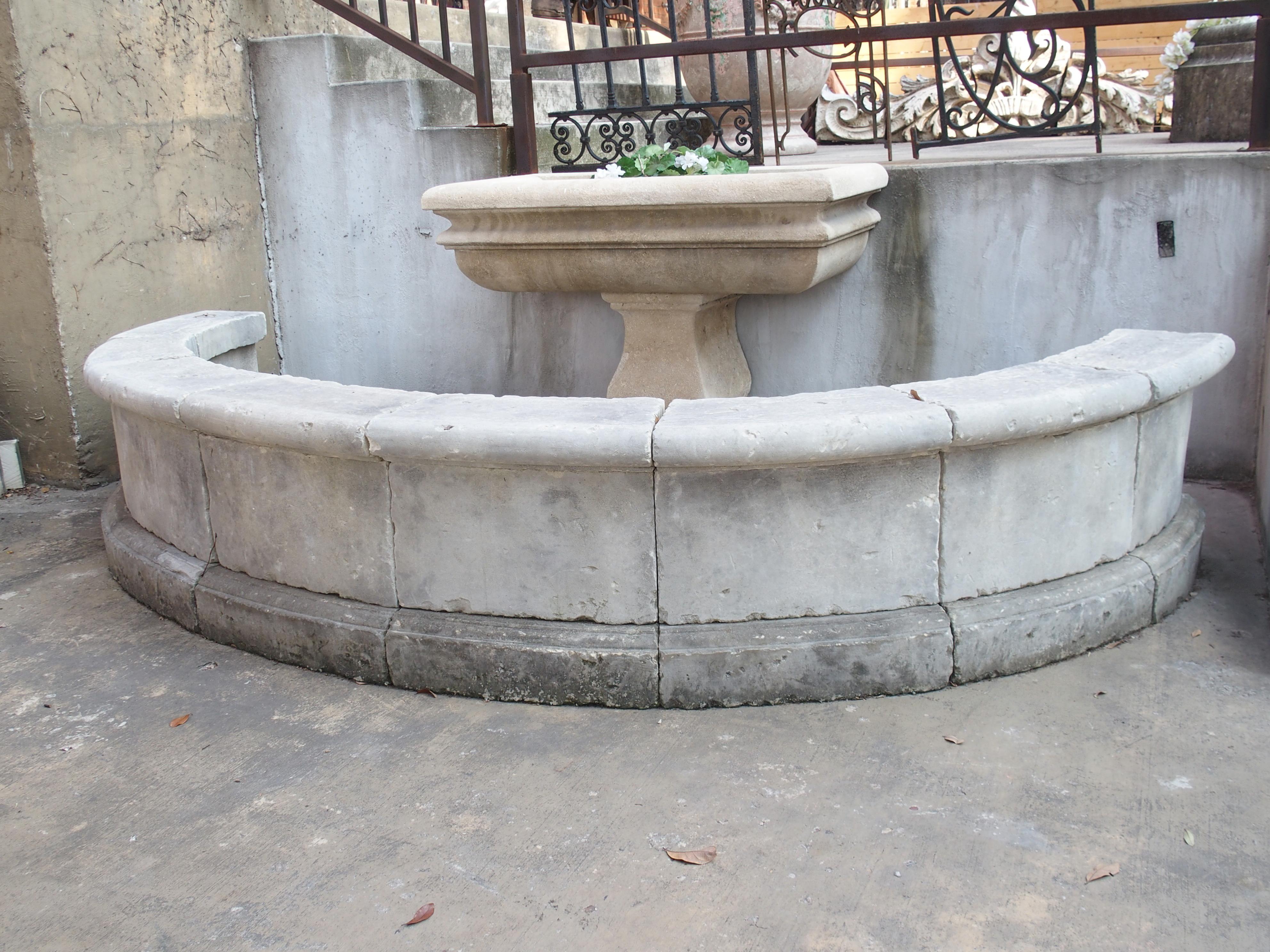 Hand-carved and distressed in Southern Italy, these stones were originally part of a large wall fountain. The 24 pieces of limestone would have formed a large semi-circular basin wall.

The curved wall consists of three tiers of stones. Large