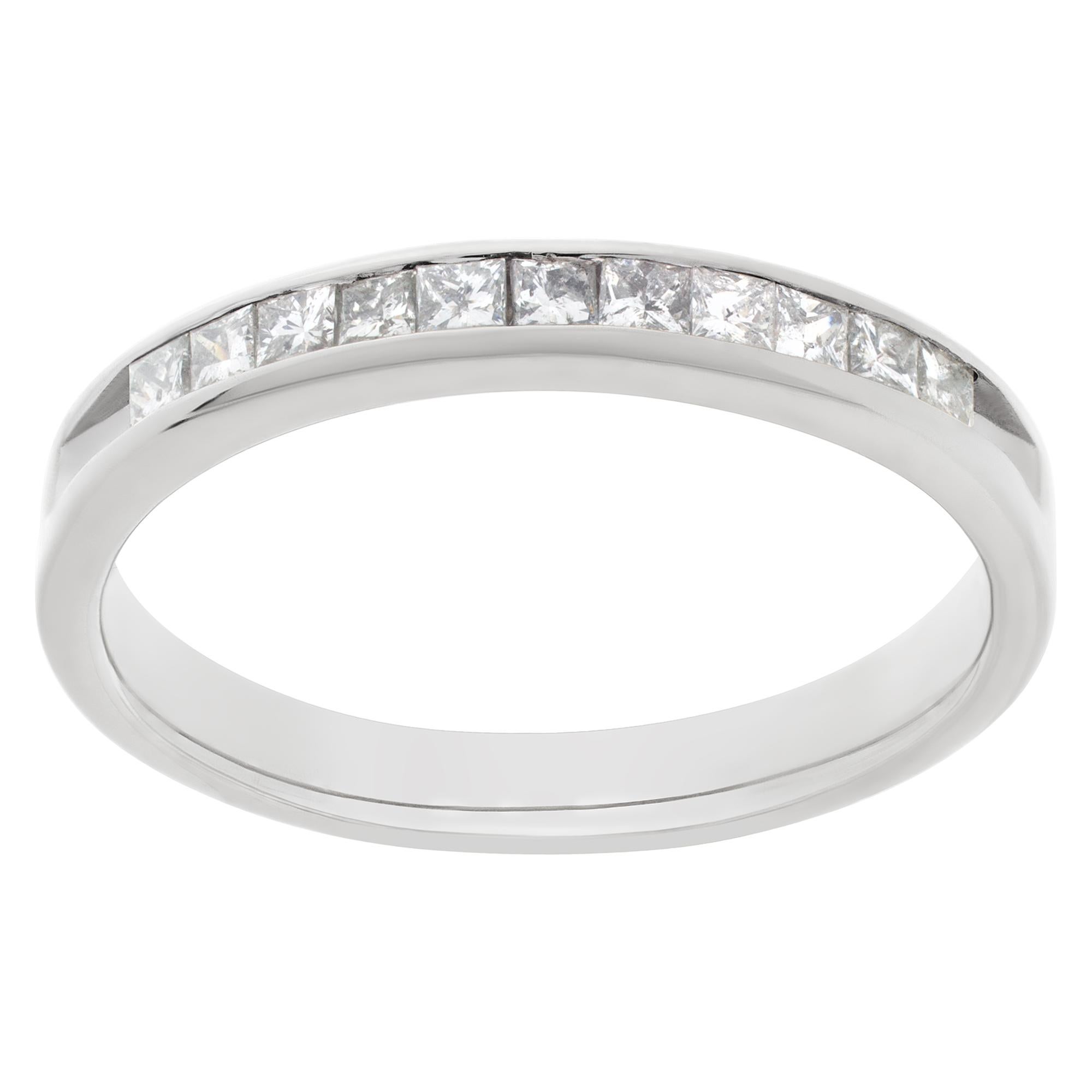 Thin & elegant semi diamond eternity band in 14k white gold ring with app. 0.55 carats in princess cut diamonds; size 6 1/4

This Diamond ring is currently size 6.25 and some items can be sized up or down, please ask! It weighs 1.6 pennyweights and