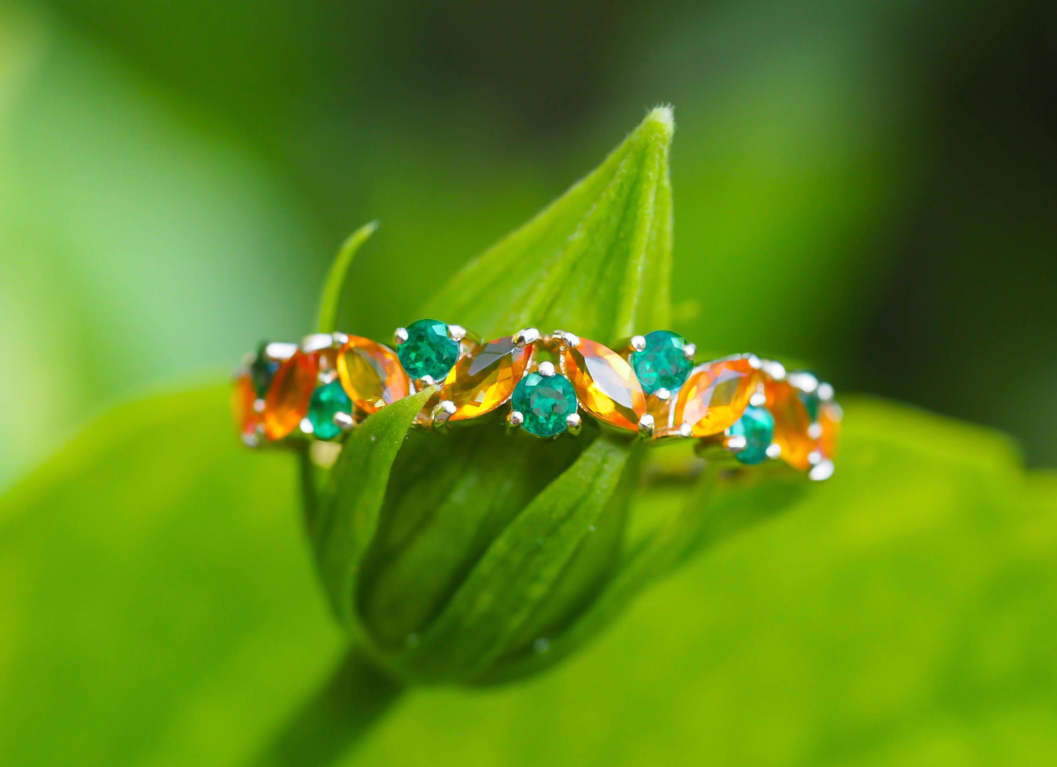 Semi eternity gold ring with opals, emeralds.  5