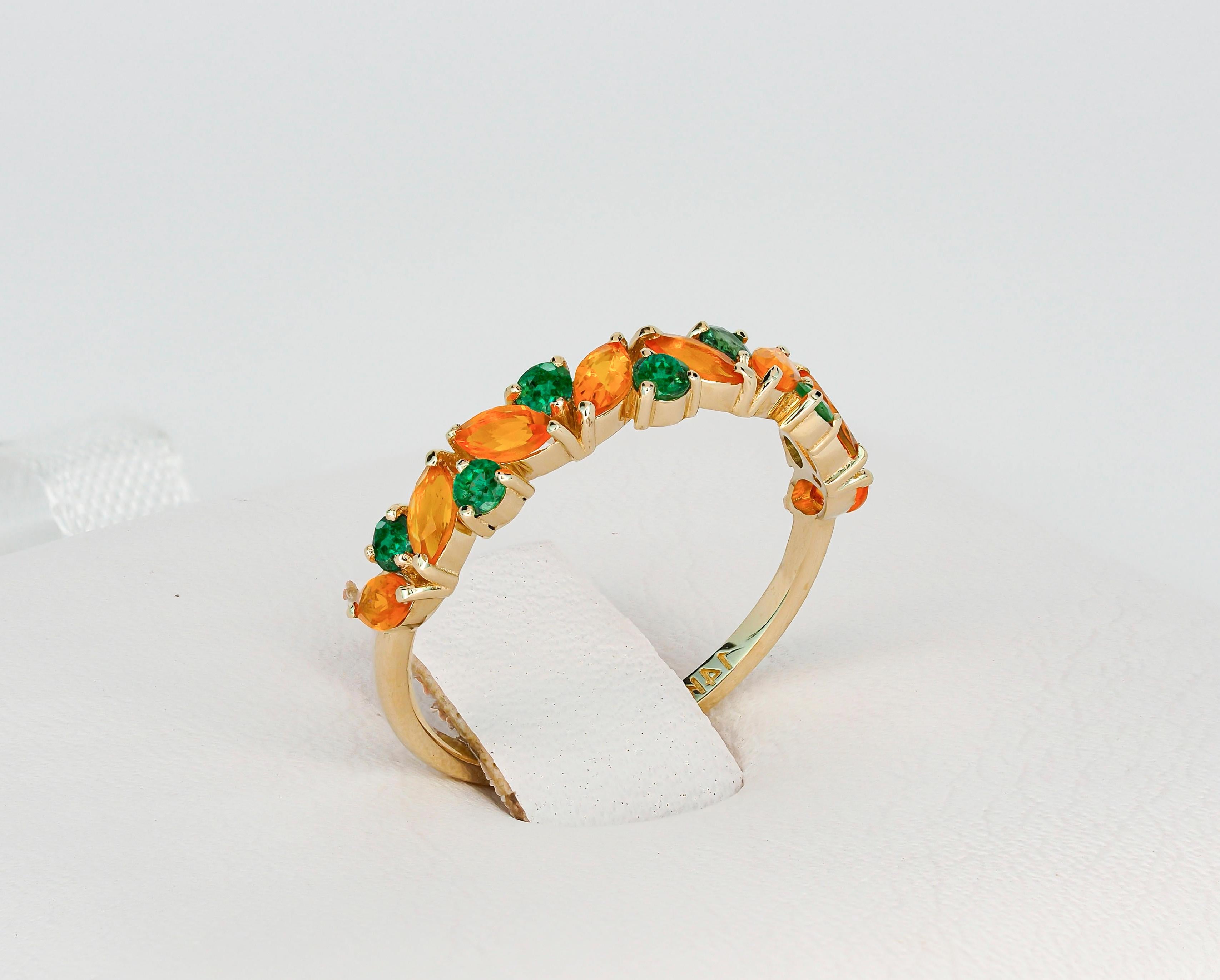 Marquise Cut Semi eternity gold ring with opals, emeralds. 