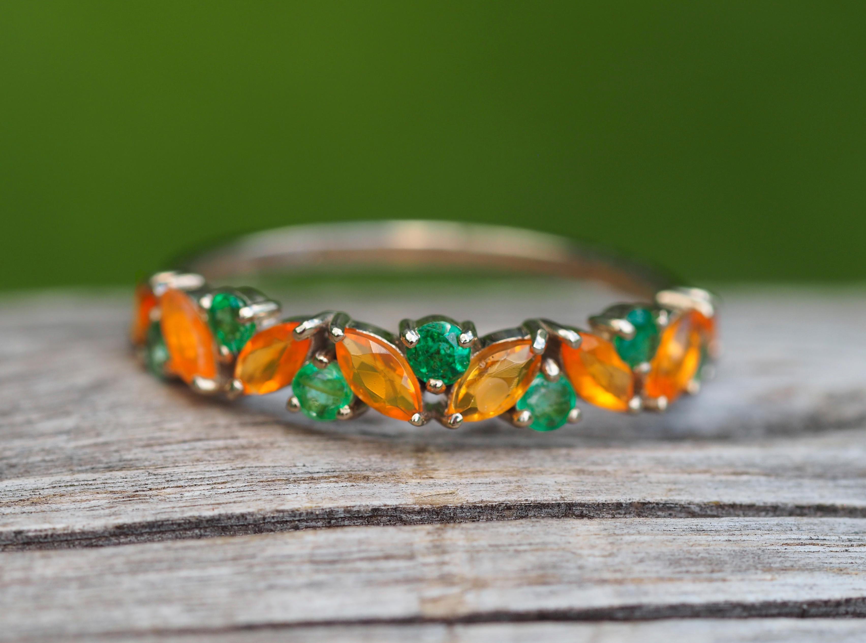 Semi eternity gold ring with opals, emeralds.  2