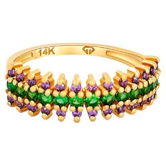 Semi eternity purple and green gems 14k gold ring band.
