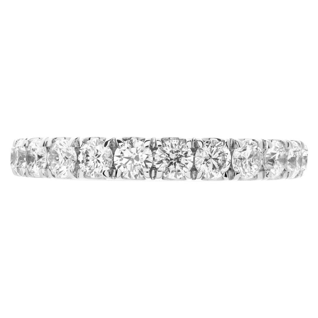 Semi eternity band in 18k white gold with approximately 0.98 carats in G-H color, VS-SI clarity round diamonds. Size 6.5.This Diamond ring is currently size 6.5 and some items can be sized up or down, please ask! It weighs 2.2 pennyweights and is