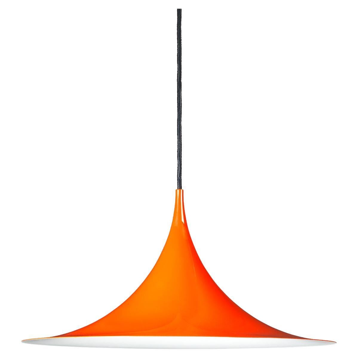 The Semi Pendant is a unique pendant lamp, based on two quarter-circles put together, back-to-back. It’s distinctive arch-shaped, enamelled metal shade creates a diffused, cone-shaped light, ideal over a dining table or kitchen work surface. With