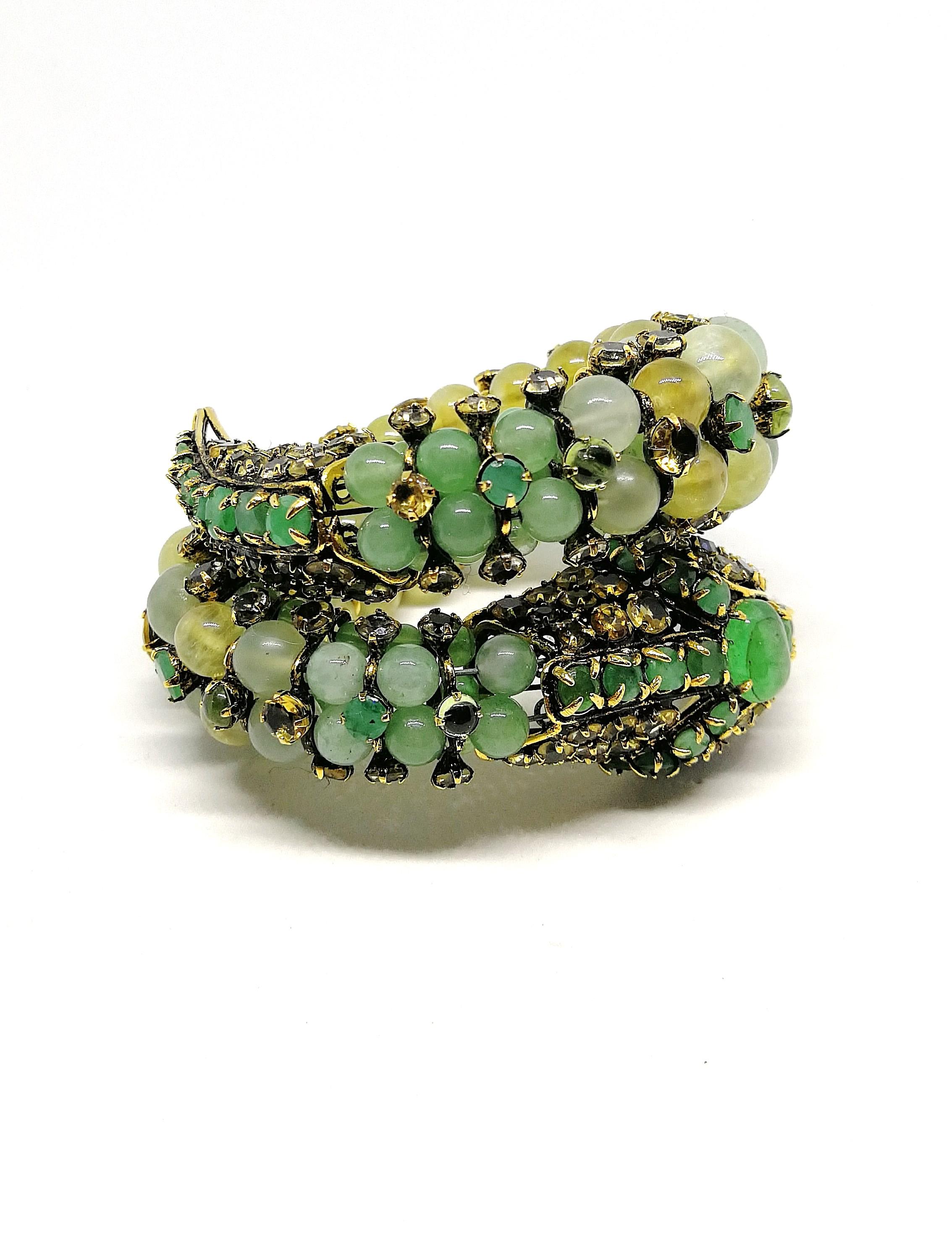 This is a true show stopper, a dynamic and vivid design! Hand made and hand wired, so well fitting and secure, this serpentine bracelet is made from emeralds and semi precious stones - peridot, citrine, aventurine, and bowenite - with sapphire paste