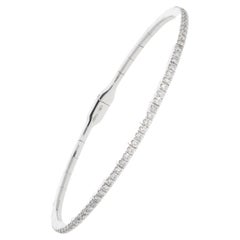 Semi-rigid bracelet with a row of 0.64 ct of Diamonds.