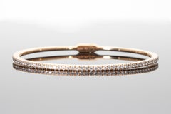 Semi-rigid bracelet with a row of 0.75 ct of Diamonds. Gold 18 Kt. Made in Italy