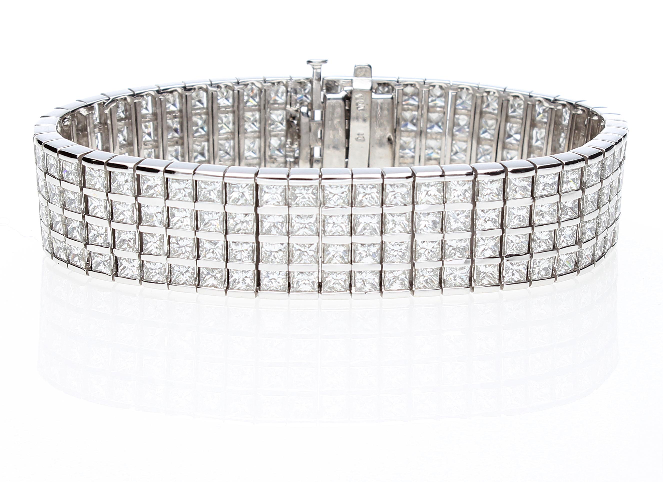 Semi-rigid bracelet with 204 princess cut diamonds total weight about 20.00 ct.
The bracelet is made up of 4 rows of princess cut diamonds, each diamond is set between two white gold rails.
The bracelet has a retractable closure and also an