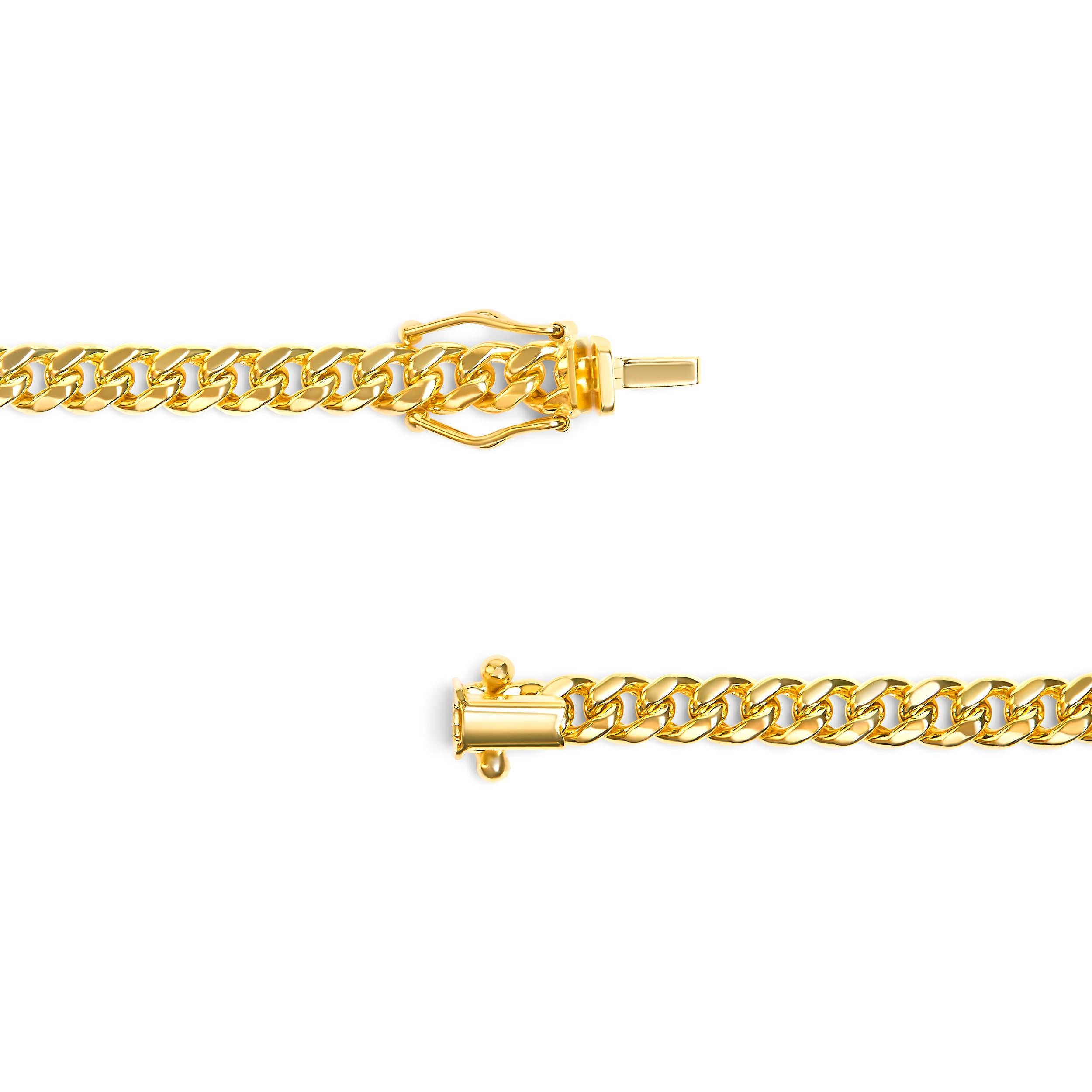 Introducing a captivating masterpiece, this Semi-Solid 14K Yellow Gold 4.5mm Miami Cuban Chain Necklace is an exquisite fusion of elegance and strength. Crafted with meticulous precision, this unisex chain boasts a generous 22-inch length, perfectly