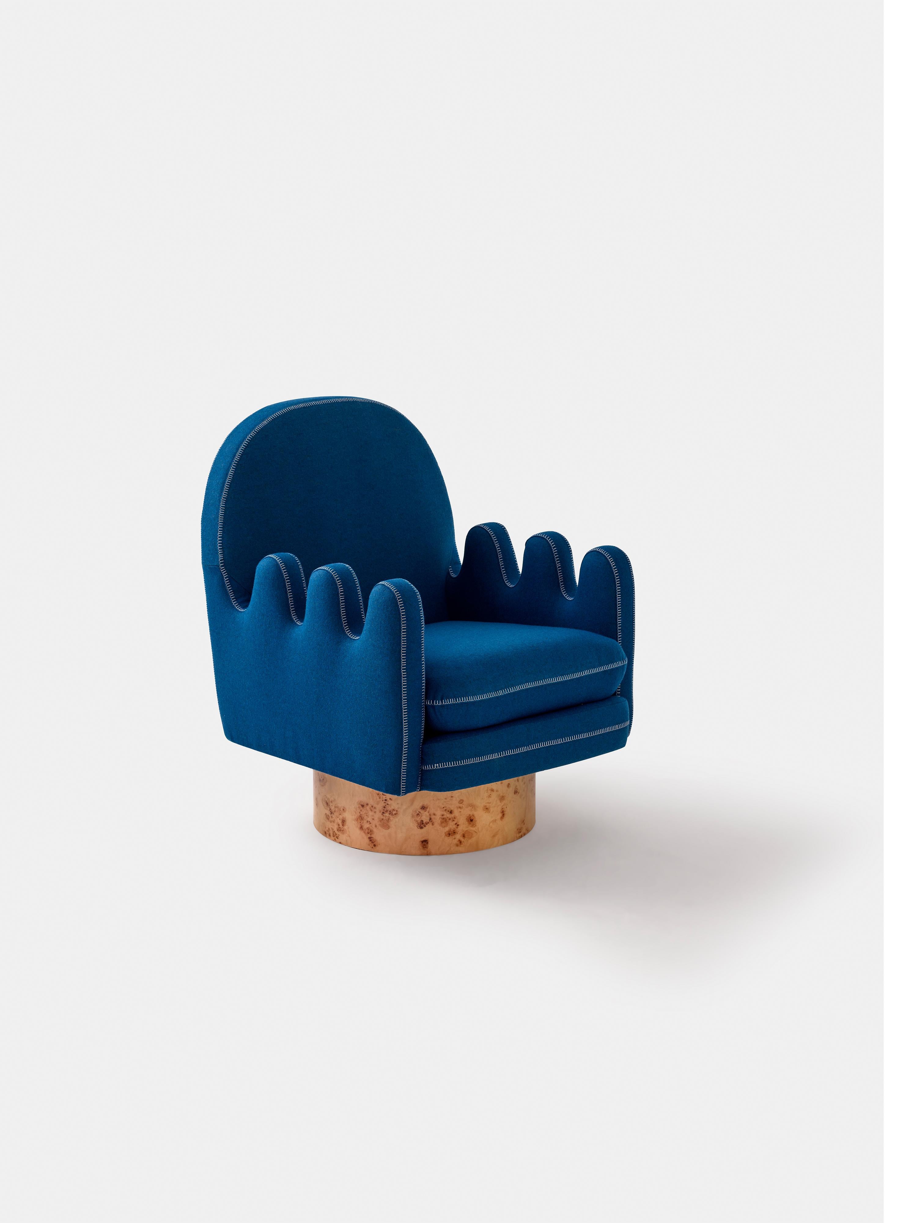 Semo Armchair by Merve Kahraman

High polished burl wood veneer and navy upholstery with white colored stitching.

28