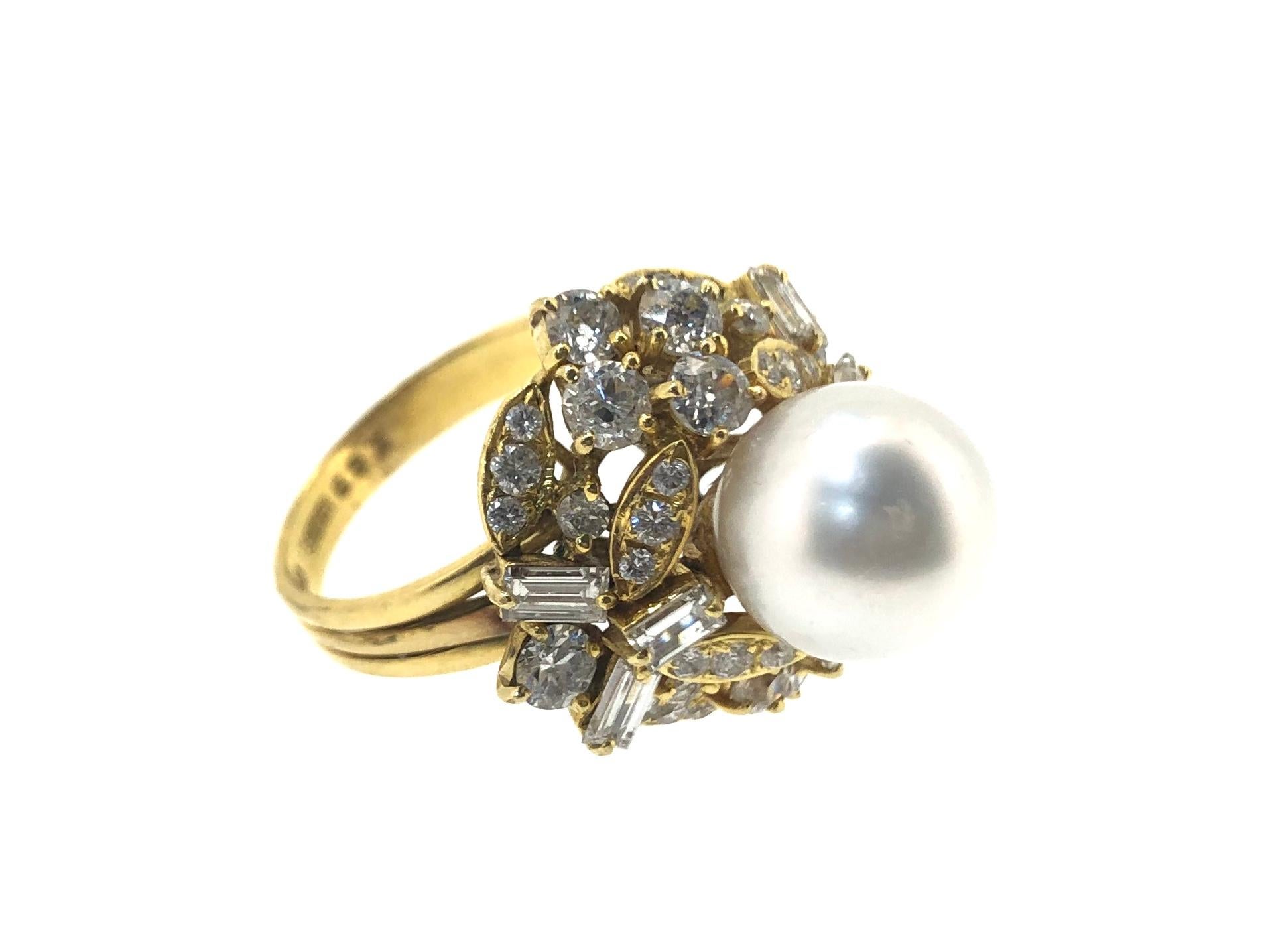 Sena South Sea Pearl and Diamond Cocktail Ring. Set with 44 round brilliant cut Diamonds in 18ct Yellow gold. Hallmarked SENA 

Approximate Pearl Size : 11mm
Approximate total diamond weight : 3.00ct
Ring Size : P
Total Weight : 12.4g
Approximate