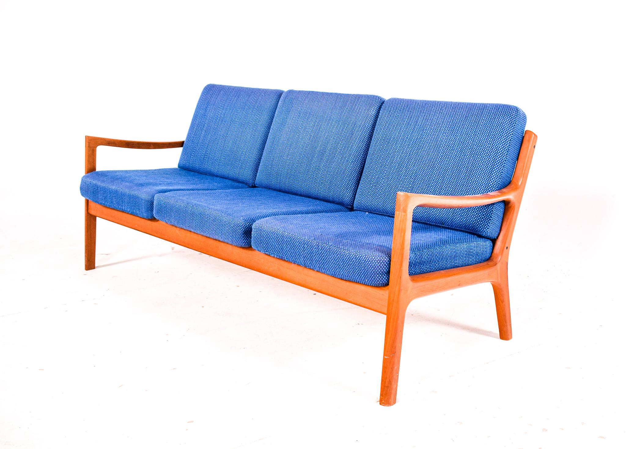 This three-seater 'Senator 166' sofa, designed by Ole Wanscher for France & Søn in the 1960s, is a paragon of Scandinavian mid-century design. The piece showcases the clean lines, quality materials, and the elegant simplicity that is hallmark to
