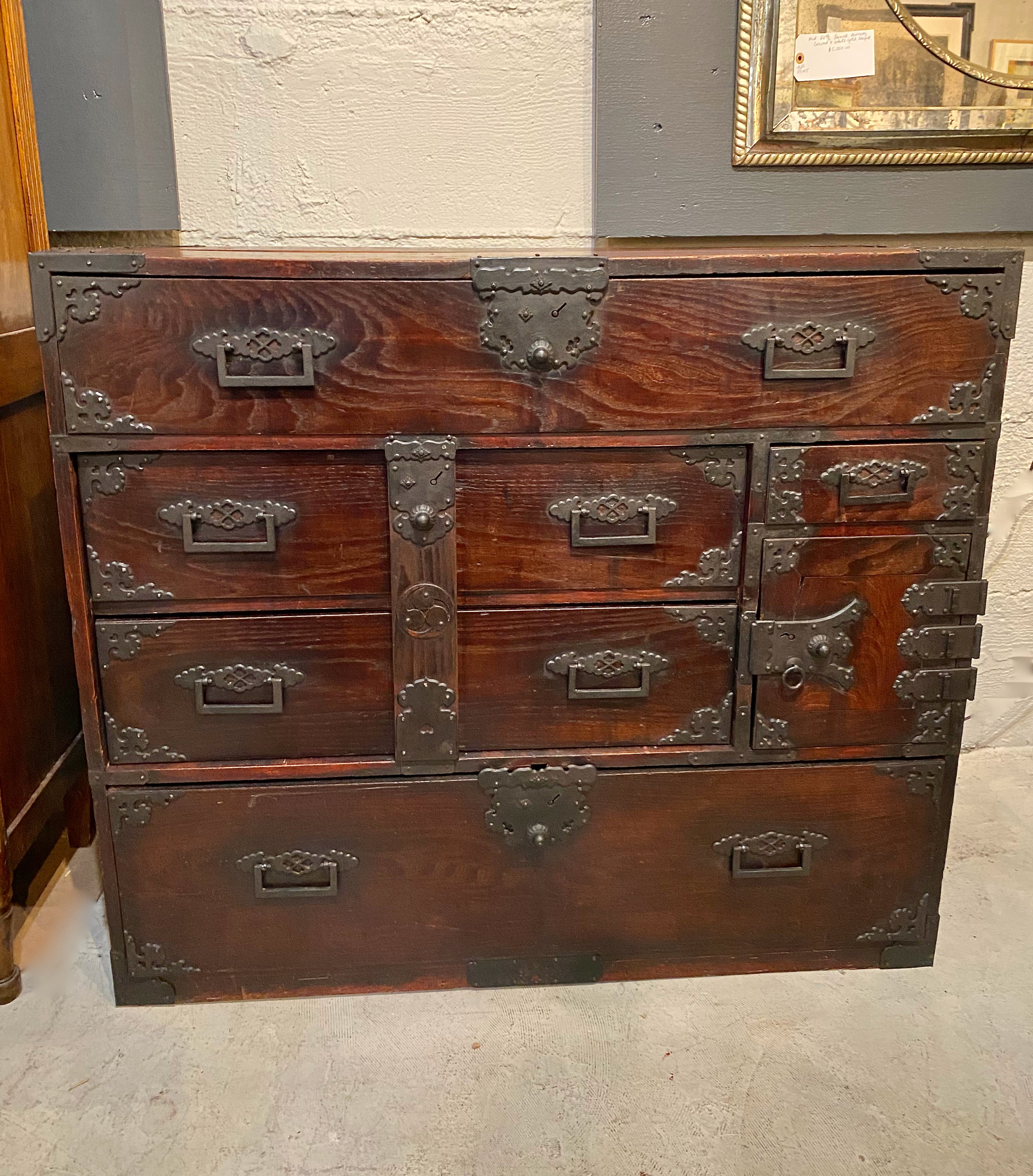 This is a very good example of a Meiji Period Sendai Tansu in Keyaki wood. This one-part tansu dates to circa 1880 and is in very good overall condition as it retains all of its original iron work, the front iron locking bar and hardware, plus its