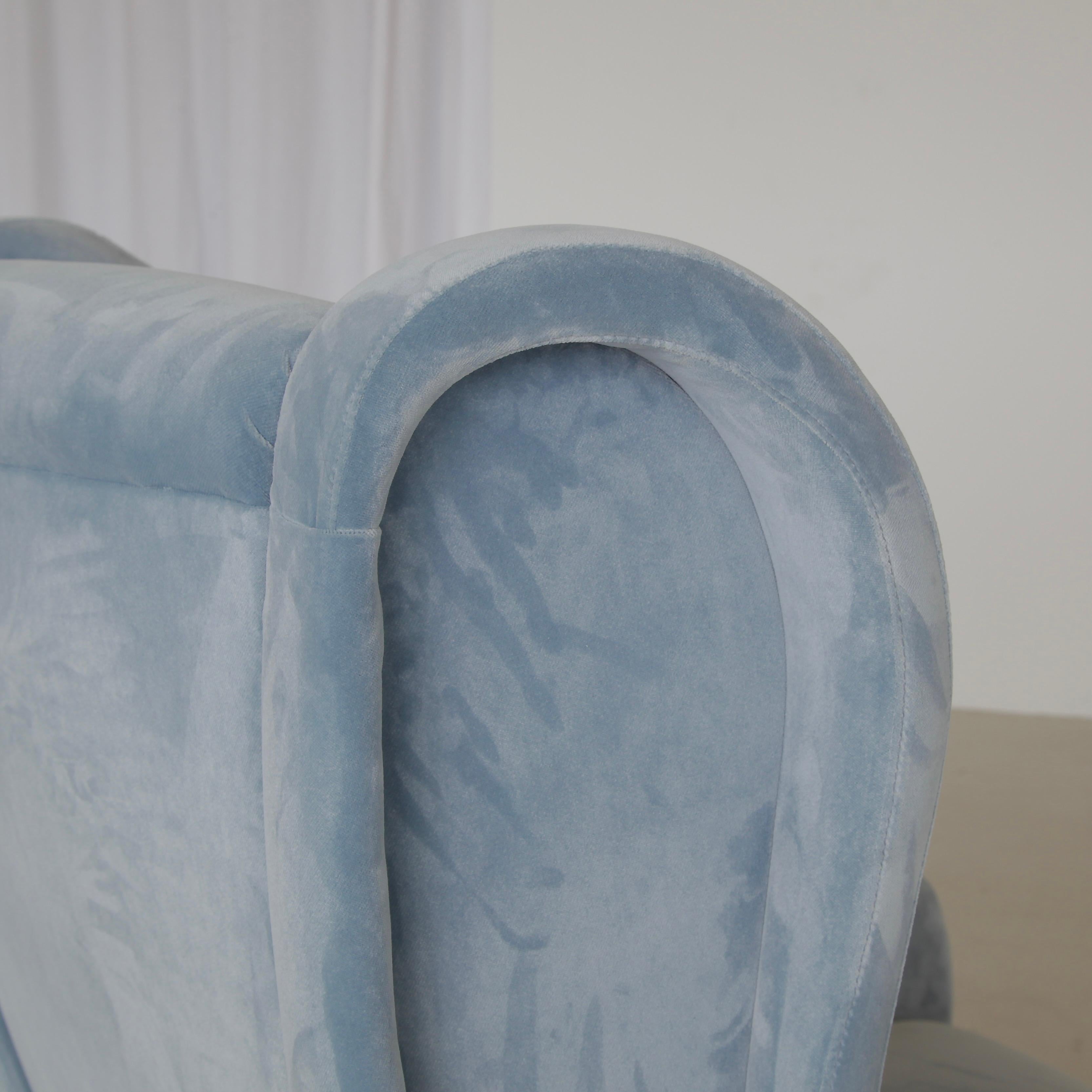 Senior Chair, designed by Marco Zanuso. Italy, Arflex, 1951.

An early original lounge chair 'Senior' with recent blue velvet upholstery. Metal frame with brass legs fittings and wooden construction.

Literature: Repertorio del Design Italiano