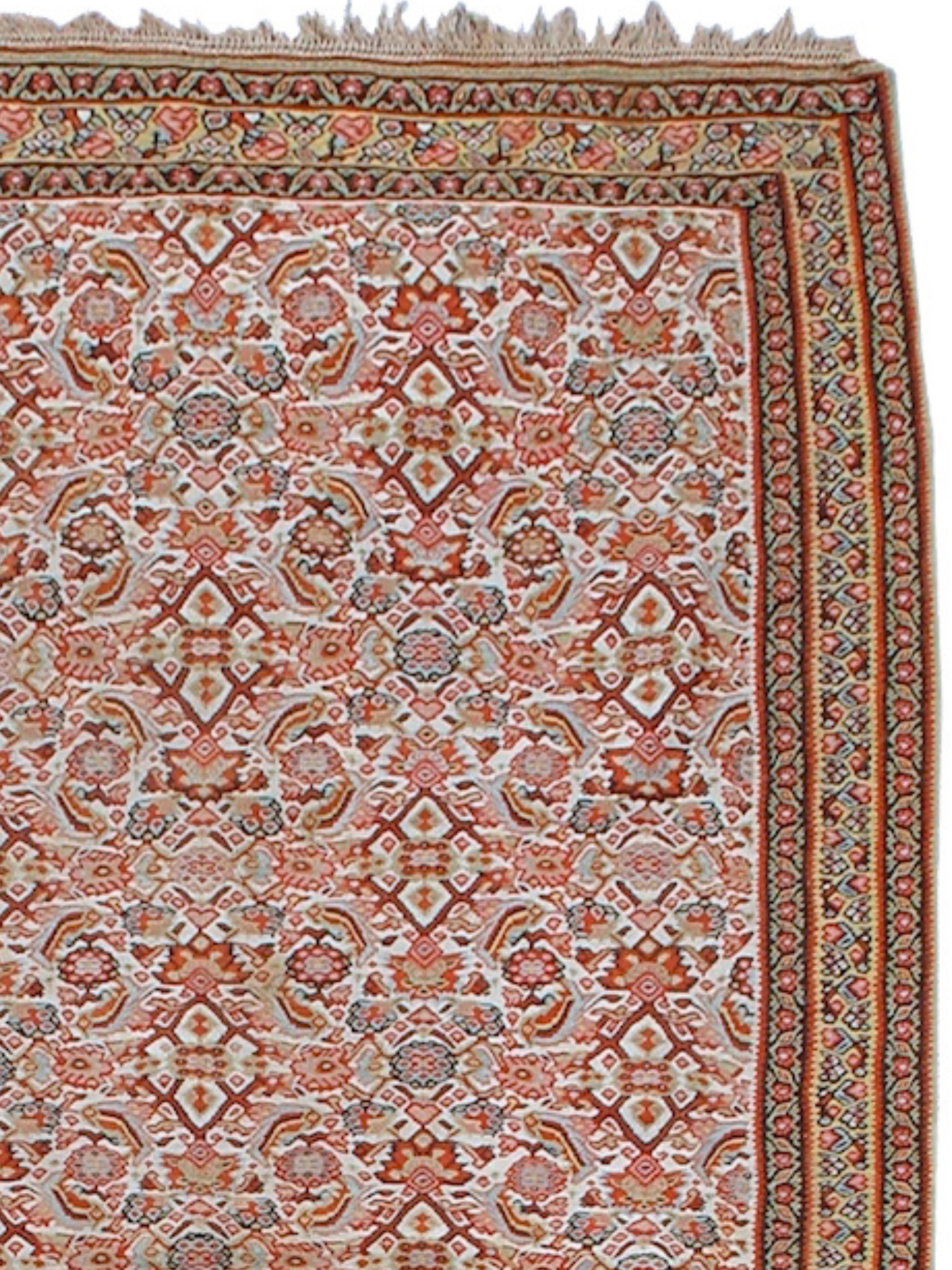 Senneh Kilim, 19th Century

This elegant Senneh kilim from western Persia uses an all-over “Herati” design of foliage incorporated into an over-all lattice. Detailing is fine and precise and accents of sky blue and brick reds provide for a pleasing