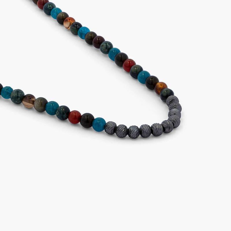 Sennit Necklace with Semi-Precious Beads and Rhodium Plated Silver

The Sennit necklace is perfect for adding colour and personality to your outfit. This necklace is skillfully strung using multicoloured 4mm semi-precious stones (gold obsidian,