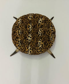 Sensational Anique Round Tufted Faux Leopard Stool with Horn Legs