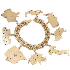 Sensational Gold Gemset Map Charm Bracelet