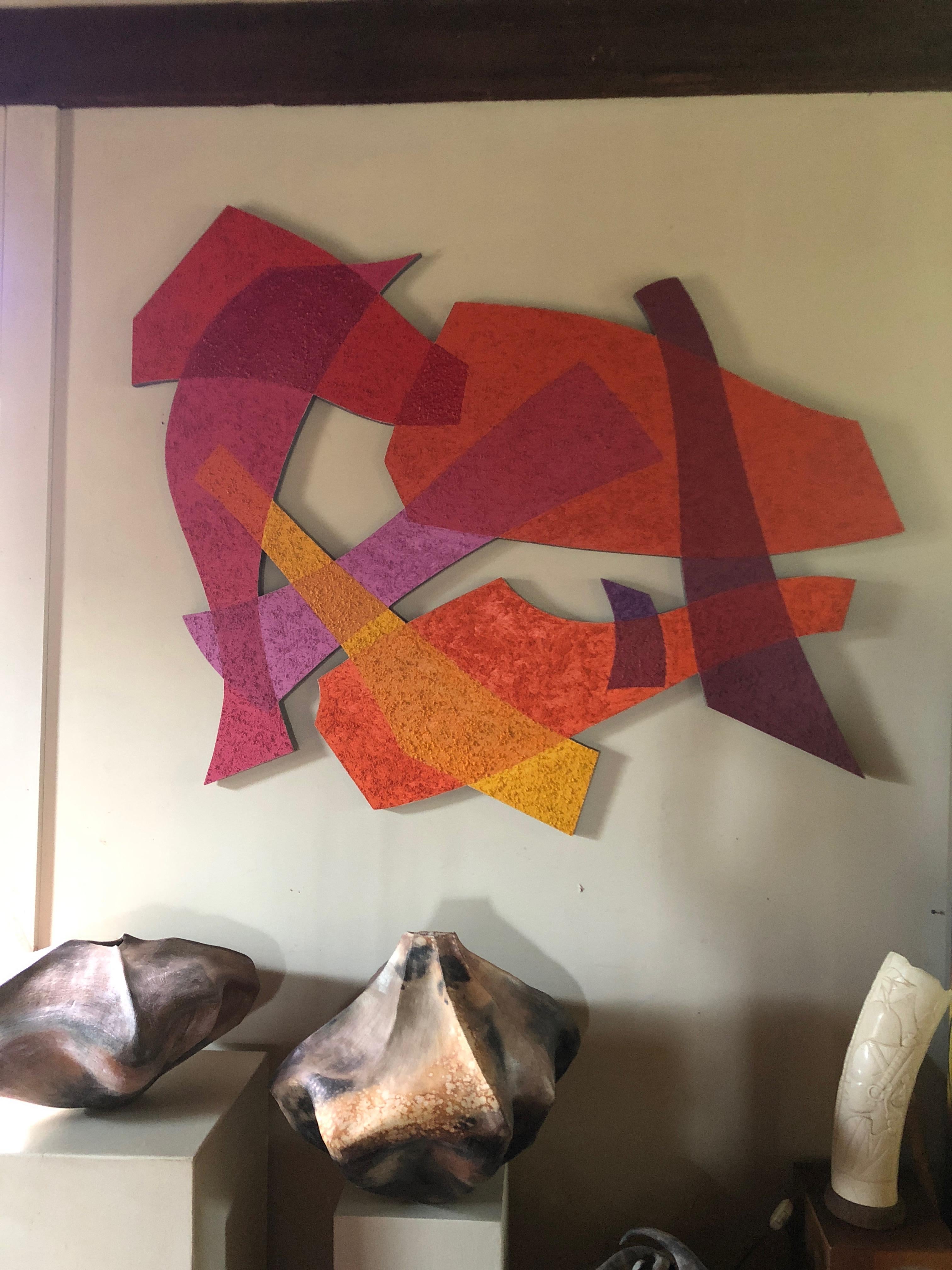 Super eye catching very large abstract acrylic and sand painting having a geometric cutout shape and bright colors that play with the eye and look like transparent layers overlapping one another. Canvas mounted on plywood with ingenious