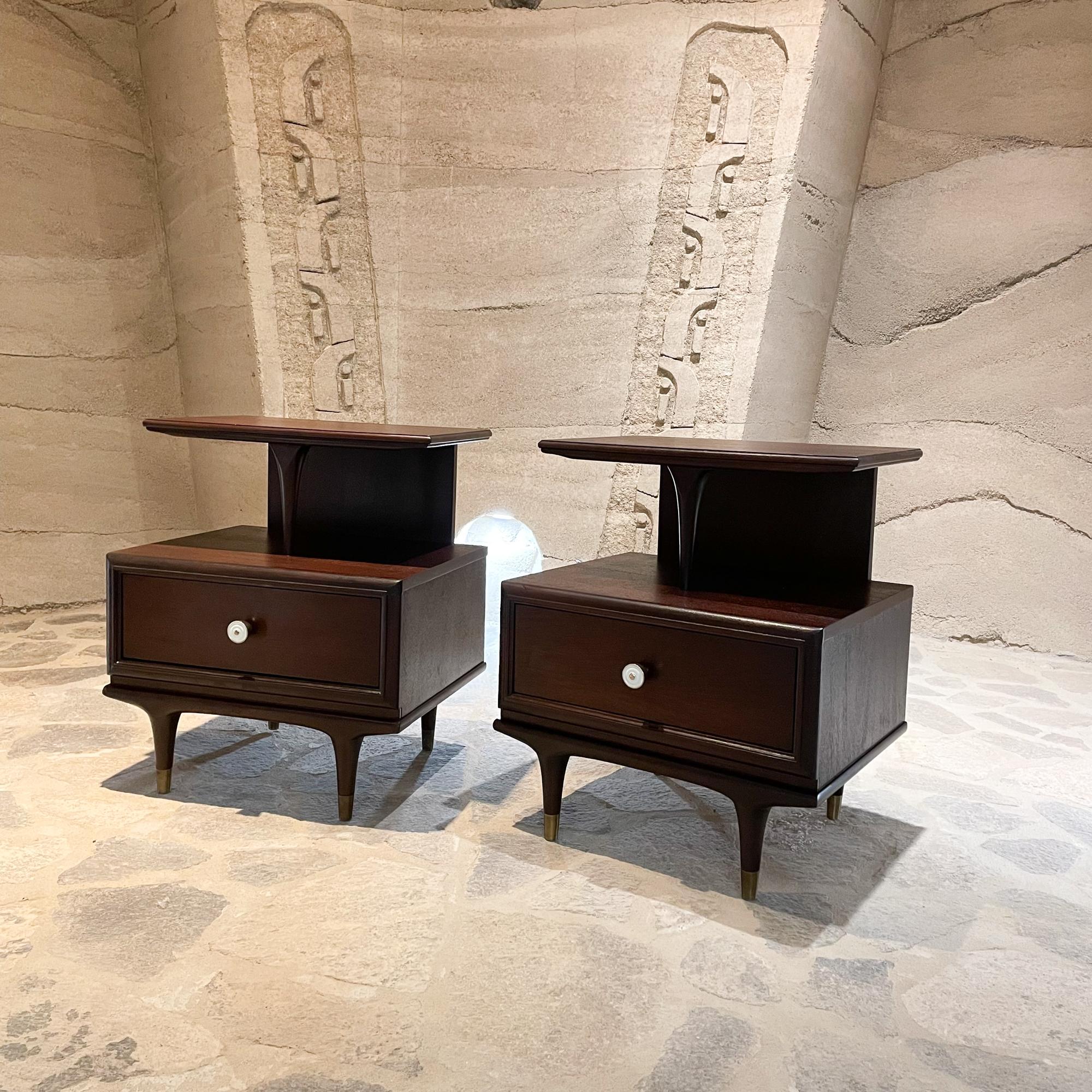 1960s Kent Coffey The Continental Fabulous Nightstands Sculptural Side Tables in Mahogany Wood with Espresso Finish
Golden Brass Tipped Legs
Midcentury Modern from Burnett's Fine Furniture of San Diego, California
Maker stamp present.
Two tiered
