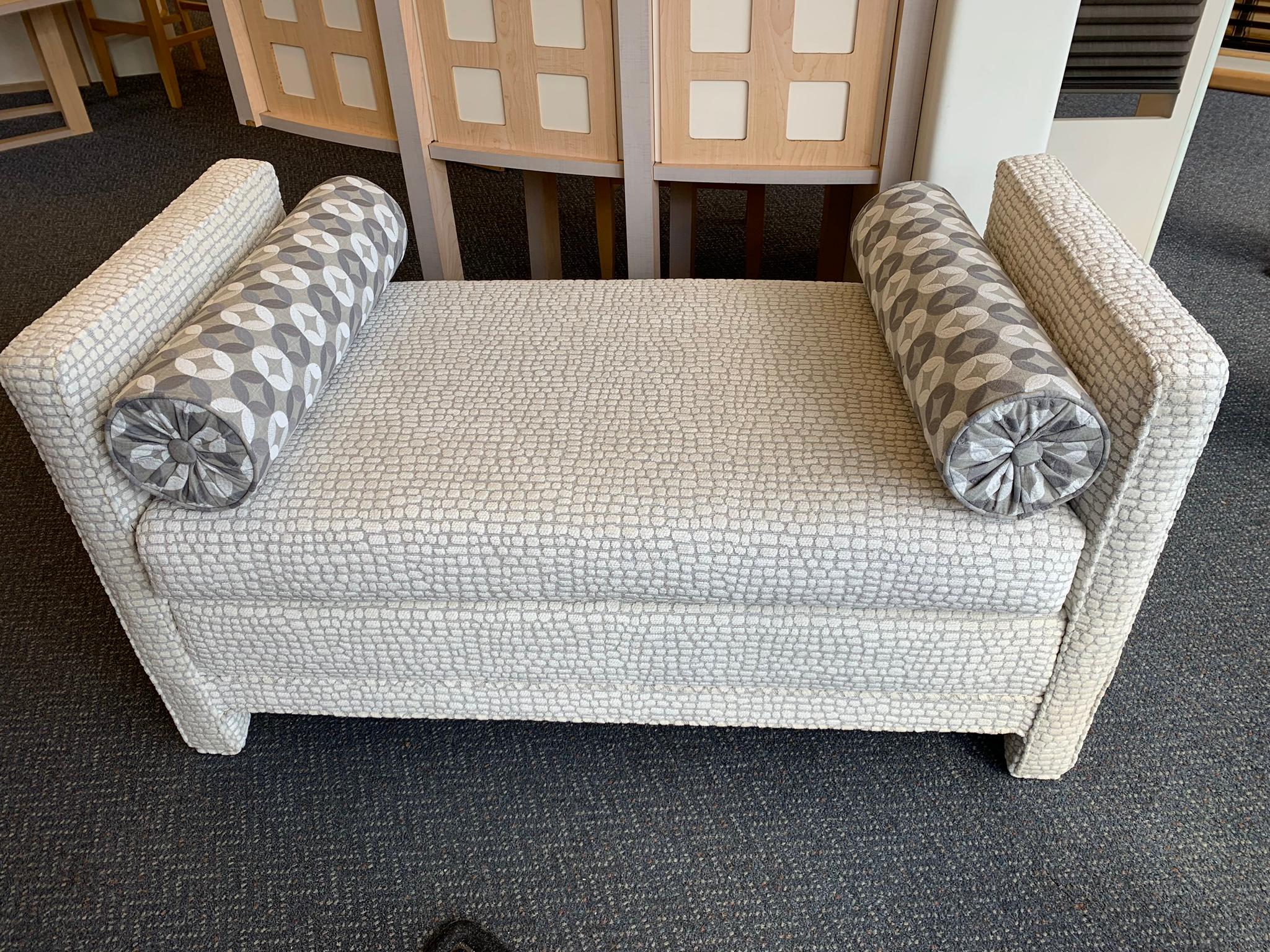 Wonderful vintage settee bench that was just completely updated with fabulous Fabricut Rapido Skin upholstery and coordinating bolsters in Fabricut Quartral. The upholstery is soft and has the feel of chenille. I.