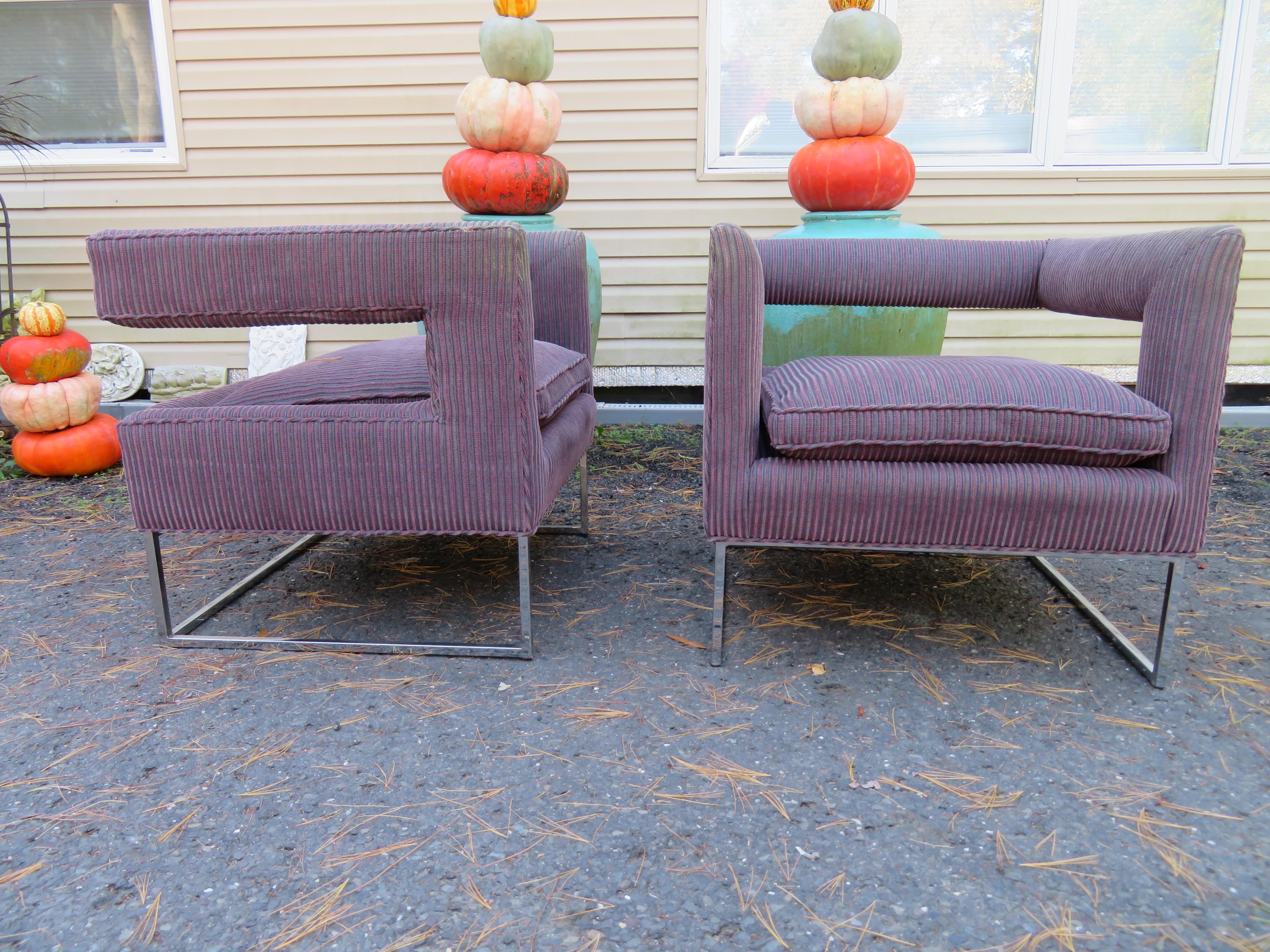 Sensational pair of Milo Baughman style open back chrome cube chairs. They are from Bernhardt’s Flair collection. The open backs appear to float sitting on square tubular chrome cube bases. The Upholstery looks newer and is a woven blue and purple