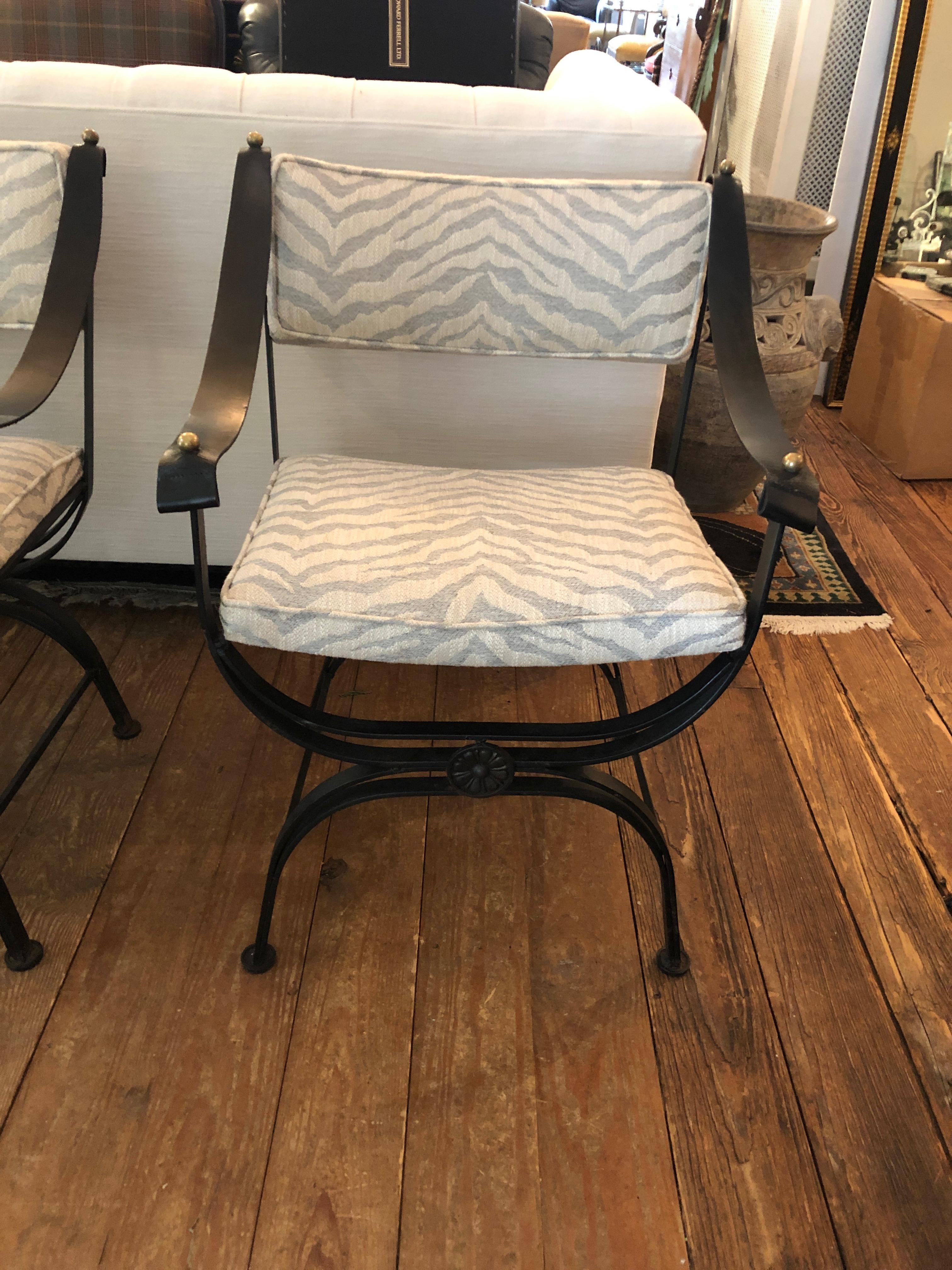 American Sensational Pair of Campaign Style Wrought Iron Club Chairs with Leather Arms