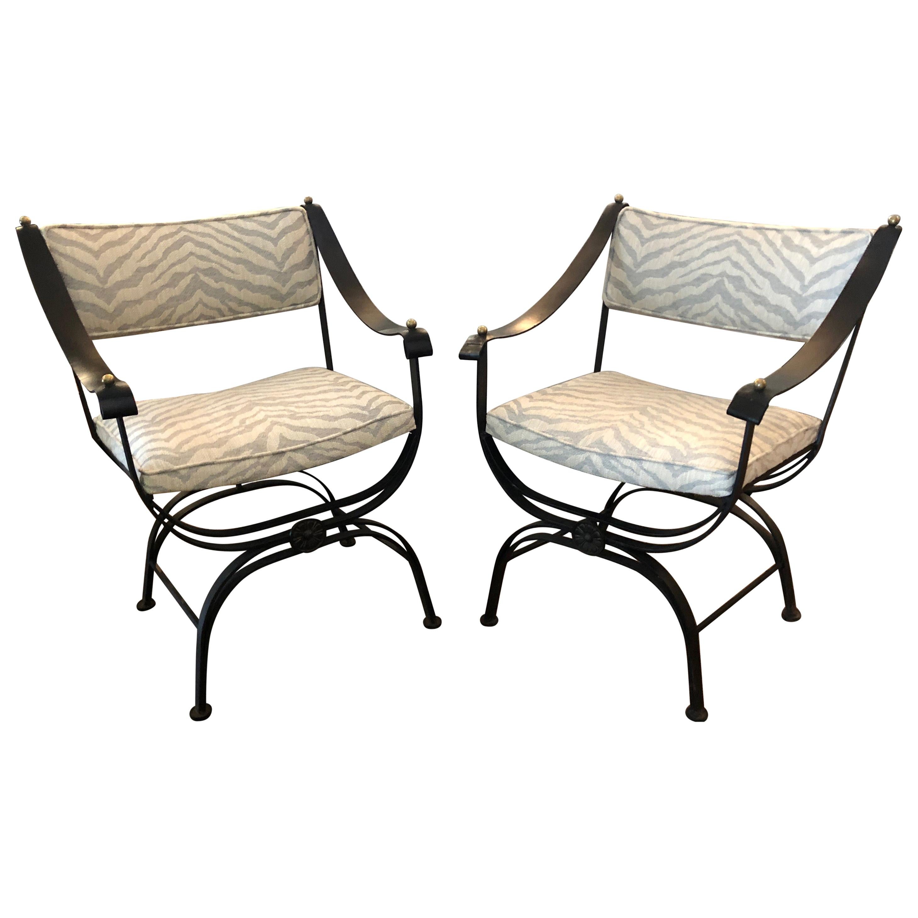 Sensational Pair of Campaign Style Wrought Iron Club Chairs with Leather Arms