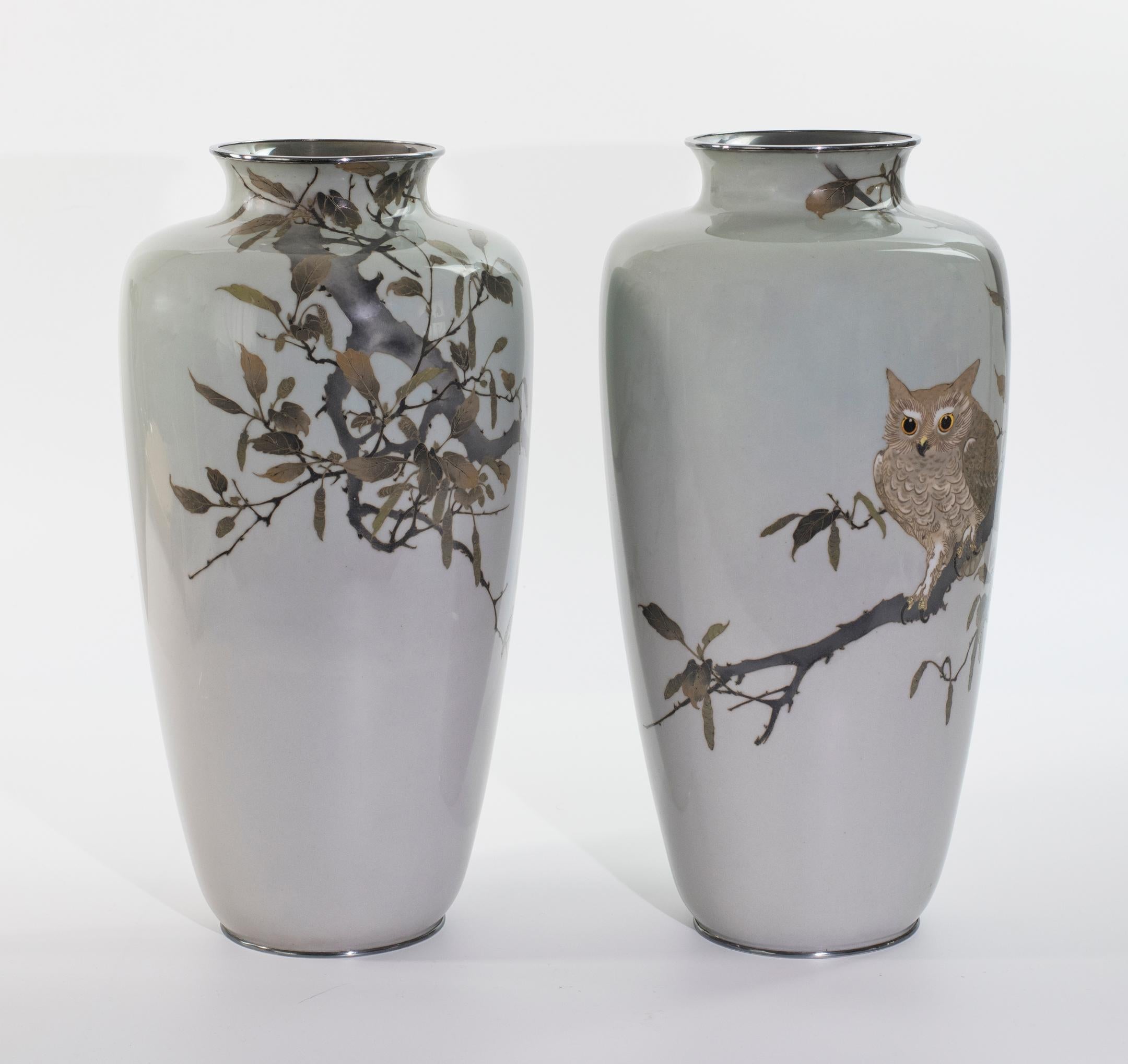 As part of our Japanese works of art collection we are delighted to offer this large and most unusual pair of Meiji Period 1868-1912 , circa 1900, cloisonne enamel vases by the highly regarded Ando company, this most unusual pair of vases depict an