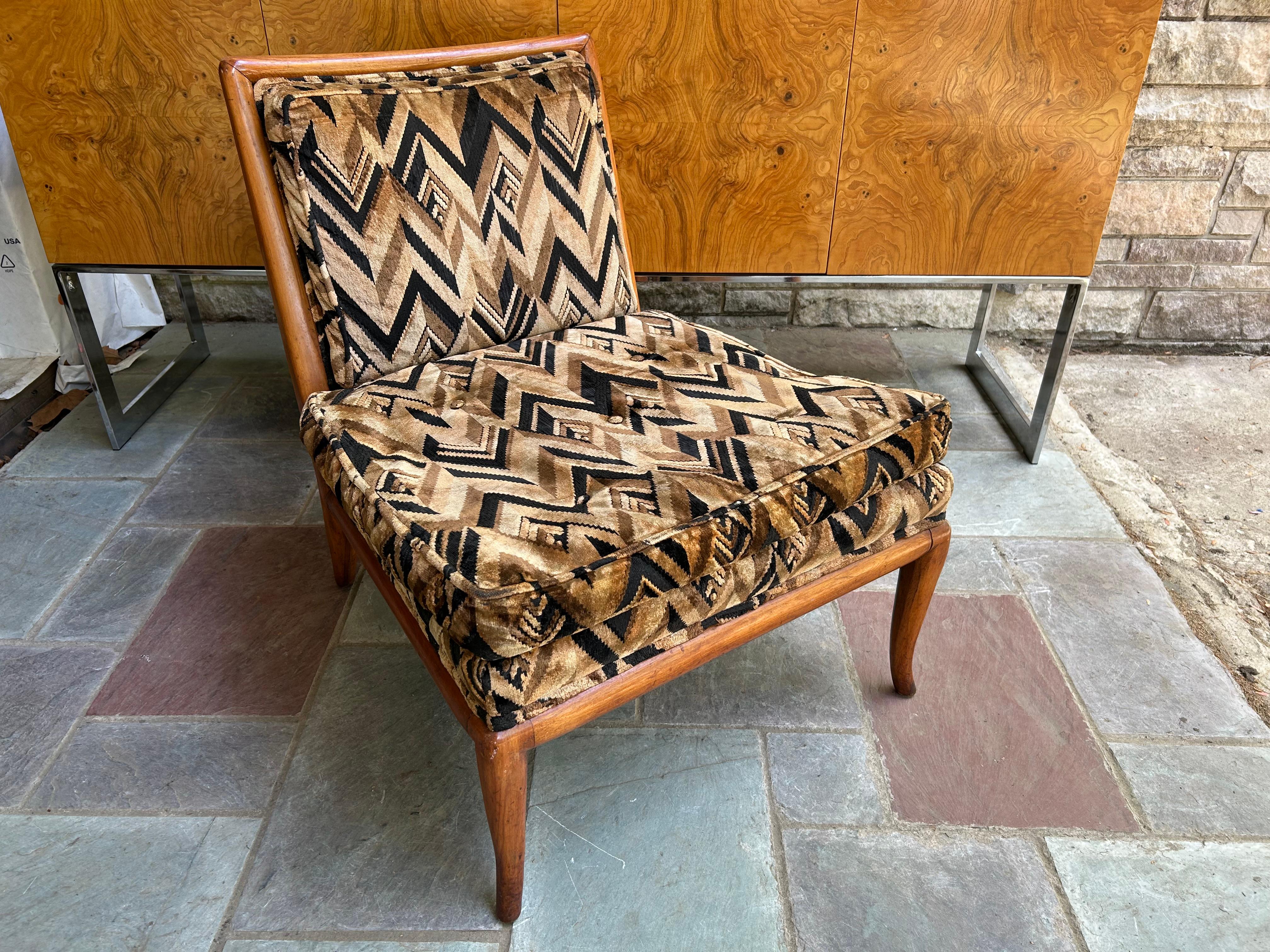 T.H. Robsjohn-Gibbings Slipper Lounge Chair for Widdicomb.  This exquisite slipper lounge chair, designed by T.H. Robsjohn-Gibbings for Widdicomb, embodies mid-century elegance and comfort.  This chair retains its original Larsen style cut velvet