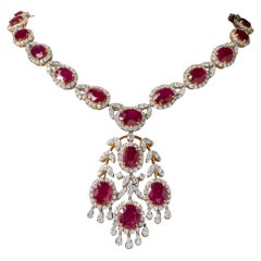 Sensations Set aus Ohrringen und Armband (154,44 Karat Rubine und Diamanten)