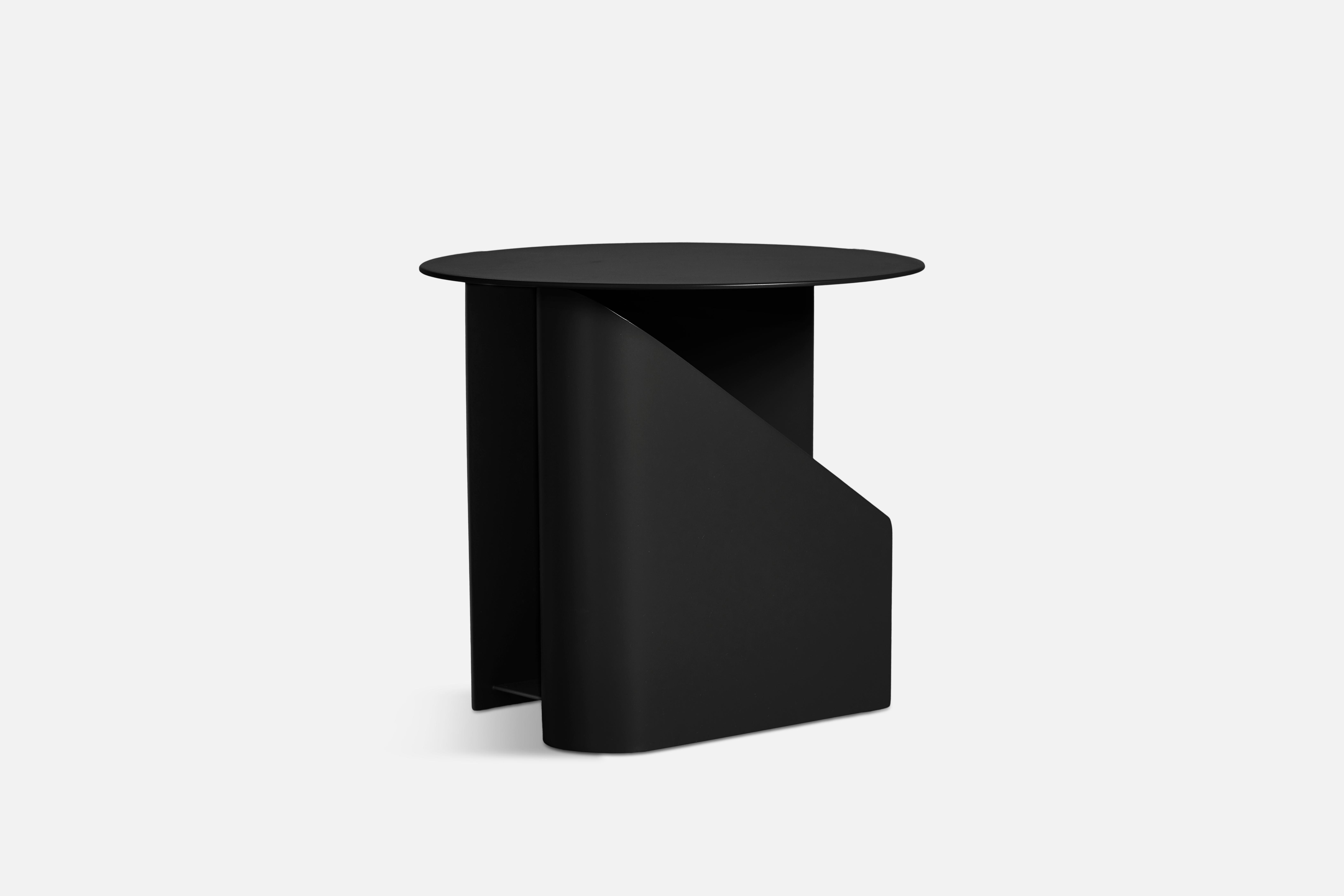 Sentrum side table by Schmahl +Schnippering.
Materials: Metal
Dimensions: D 40 x W 40 x H 36 cm
Also available in different colours.

The founders, Mia and Torben Koed, decided to put their 30 years of experience into a new project. It was time