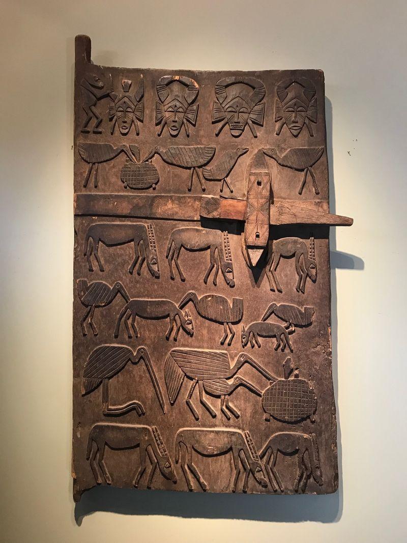 Tribal Senufo Granary Door Depicting Series of Animals and Masks For Sale