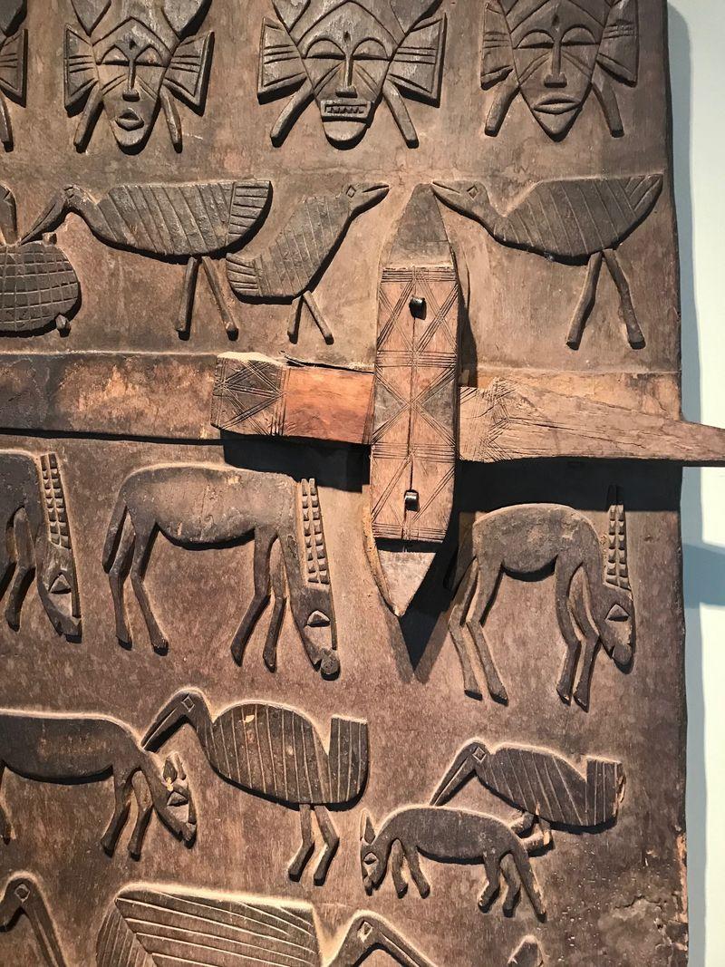 Ivorian Senufo Granary Door Depicting Series of Animals and Masks For Sale