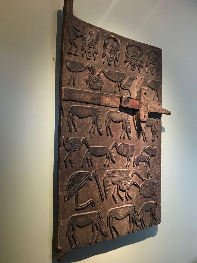 Carved Senufo Granary Door Depicting Series of Animals and Masks For Sale